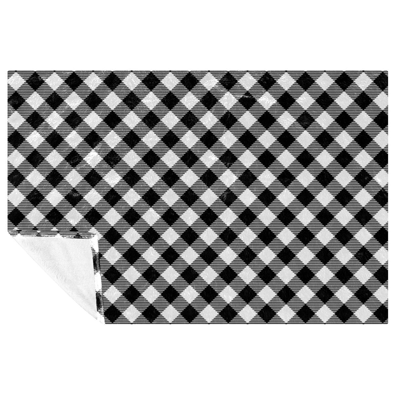 Plaid noir et blanc à carreaux pour vos soirées cocooning au lit ou canapé