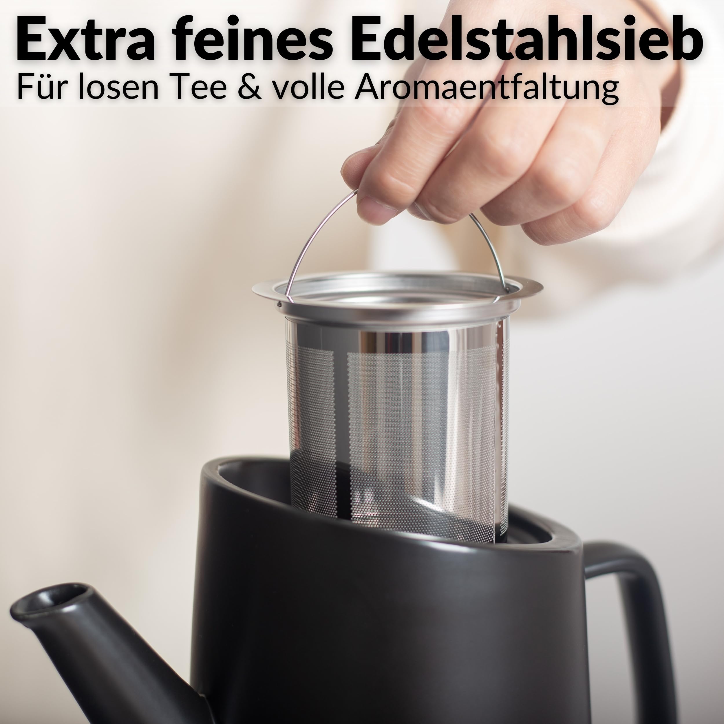 DEKAZIA® Keramik Teekanne mit Siebeinsatz und Stövchen Set - Großer Teapot für losen Tee, 1,2L Porzellan Kanne mit Edelstahl Filter und Teelicht Wärmer Schwarz Steingut
