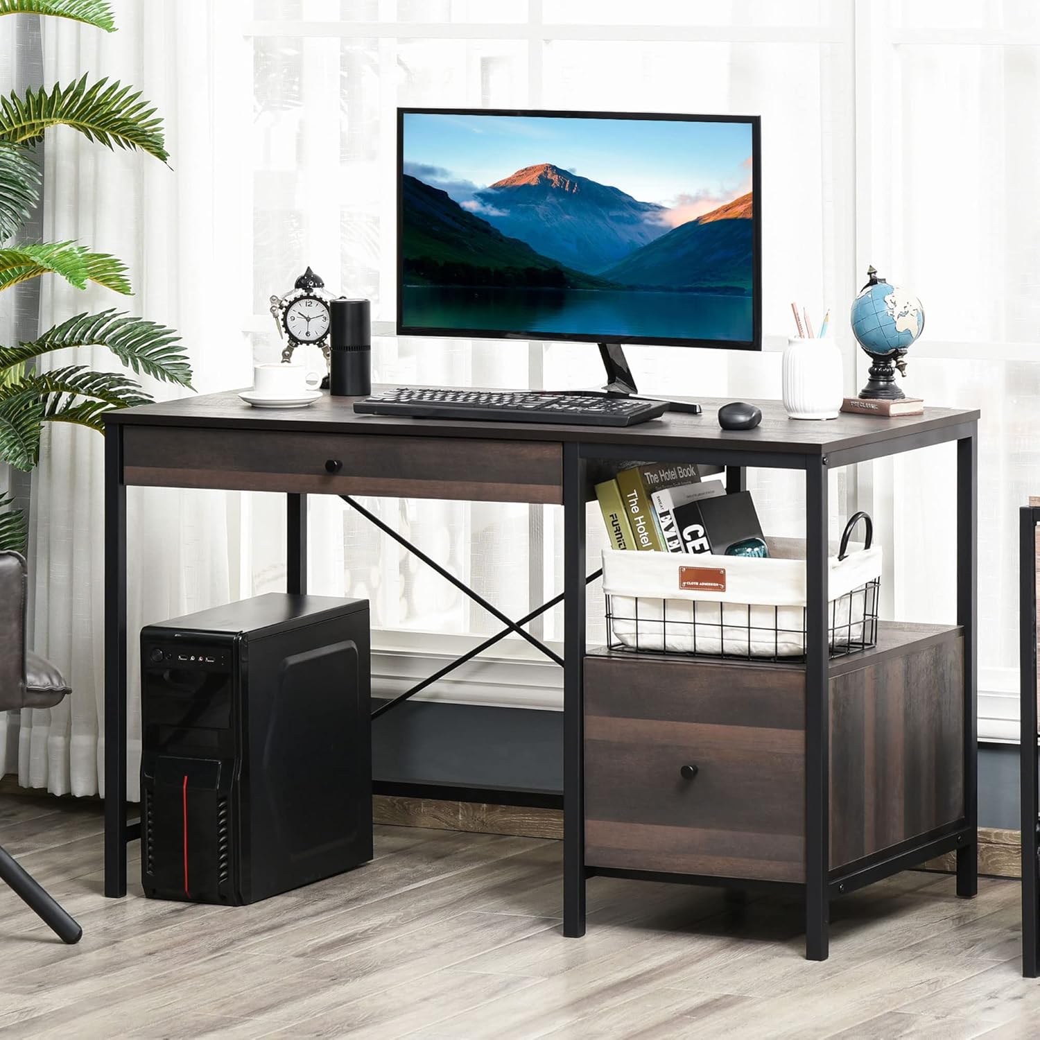 Desk in use with monitor and computer tower