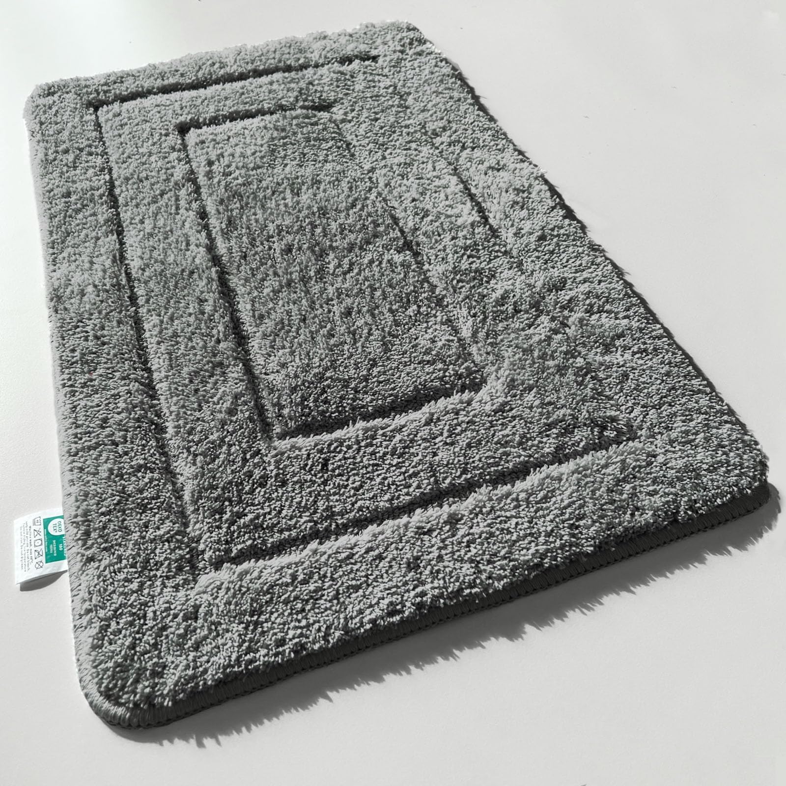 KARAT Badteppich Atlantis - extra flauschig & schnelltrocknend - Badezimmerteppich mit rutschsicherer Rückseite - Badematte Duschvorleger (50 x 80 cm, Dunkelgrau)