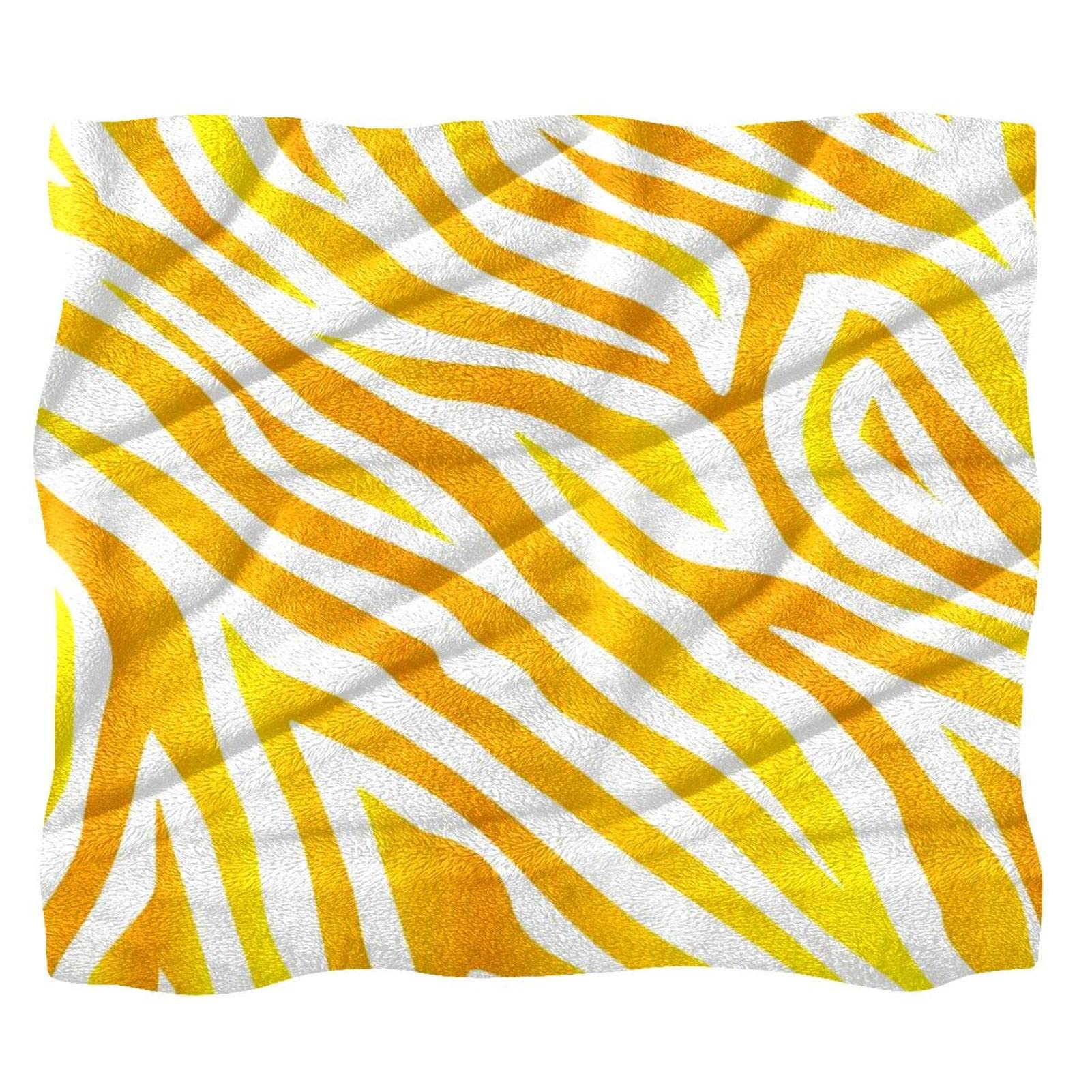Couverture polaire douce jaune doré motif zèbre pour une chaleur optimale de lit