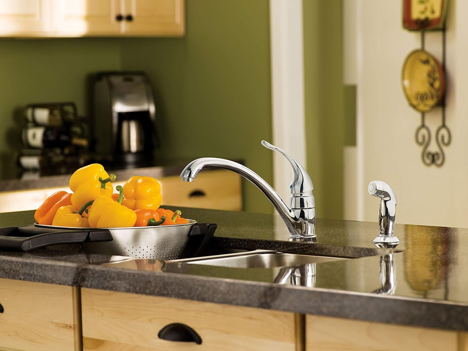 Moen kitchen faucet installed in a modern kitchen with fresh produce