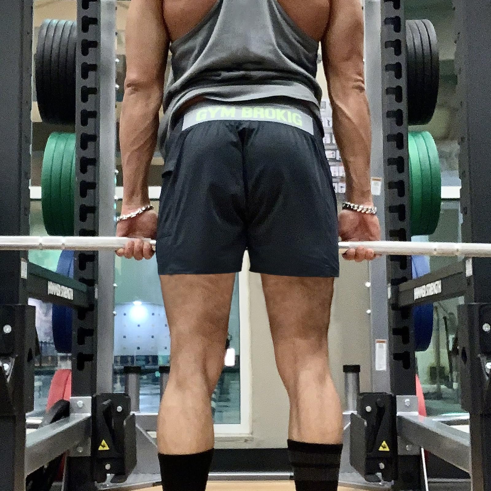 BROKIG Short de sport léger pour homme, taille élastique, course à pied, entraînement, sport, short pour homme avec poches zippées