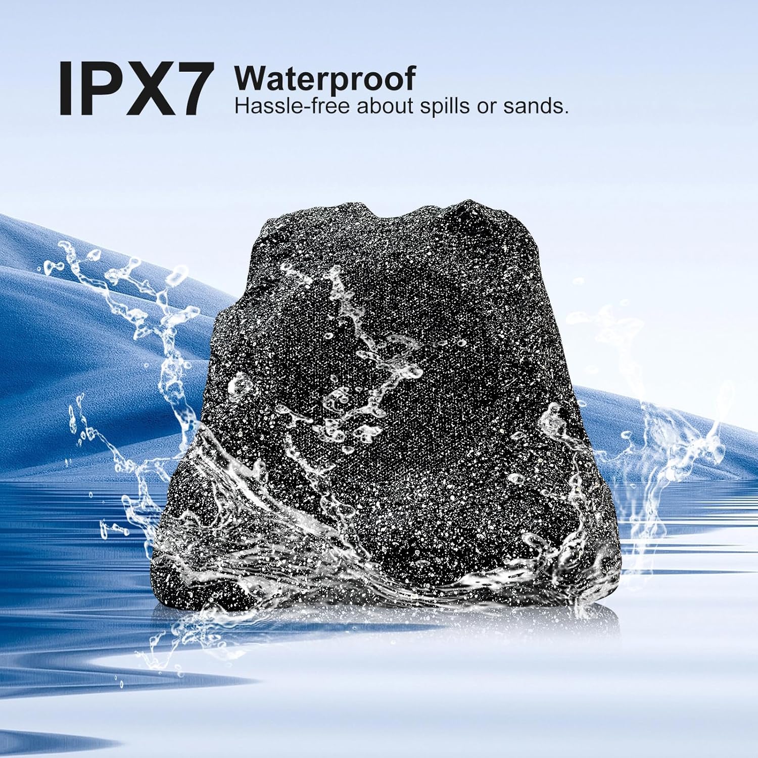 A STUDIOFINIX rock speaker with water splashing around it, illustrating its IPX7 waterproof rating.