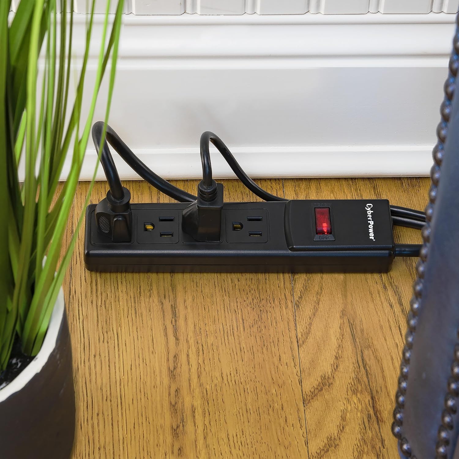 CyberPower CSB404MP6 Surge Protector in use on a floor