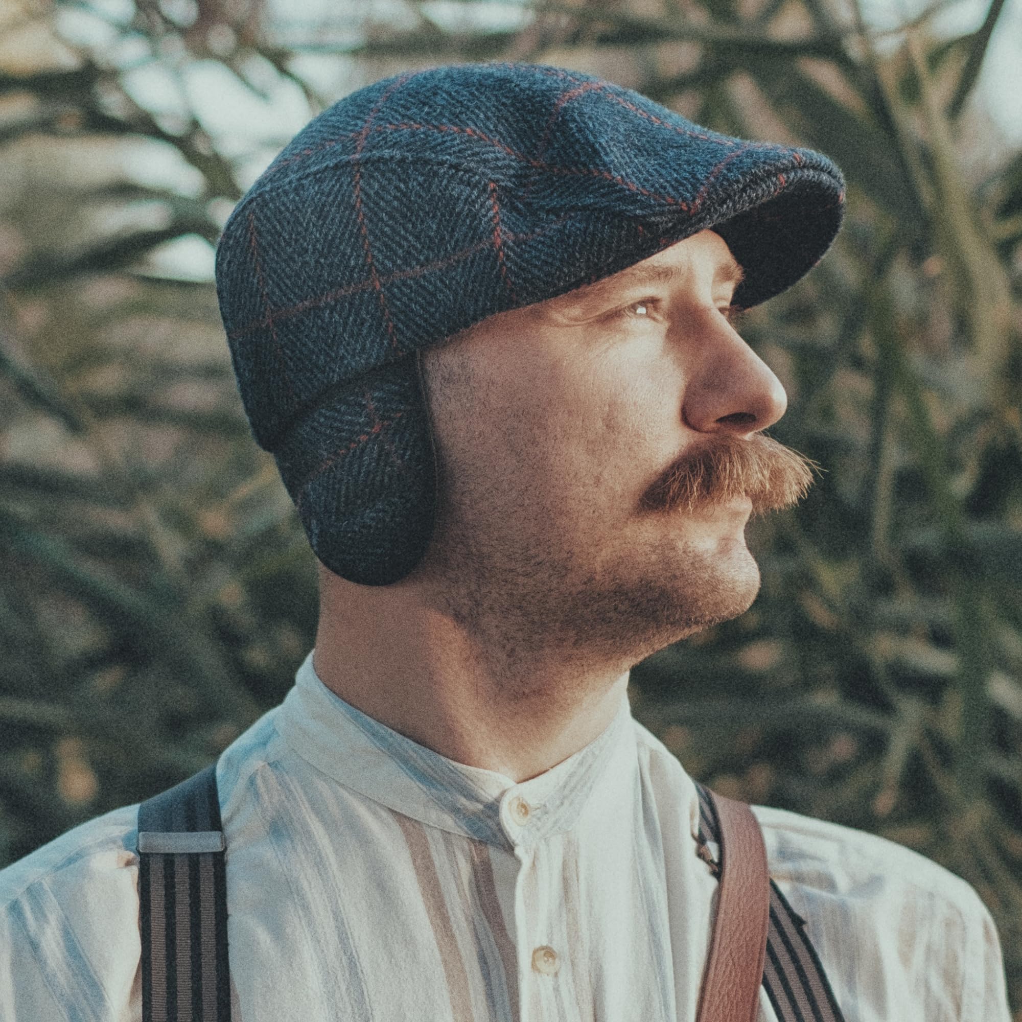 Sterkowski Norte | Harris Tweed Schirmmütze für Herren und Damen | Warm Flat Cap mit Einklappbaren Ohrenklappen