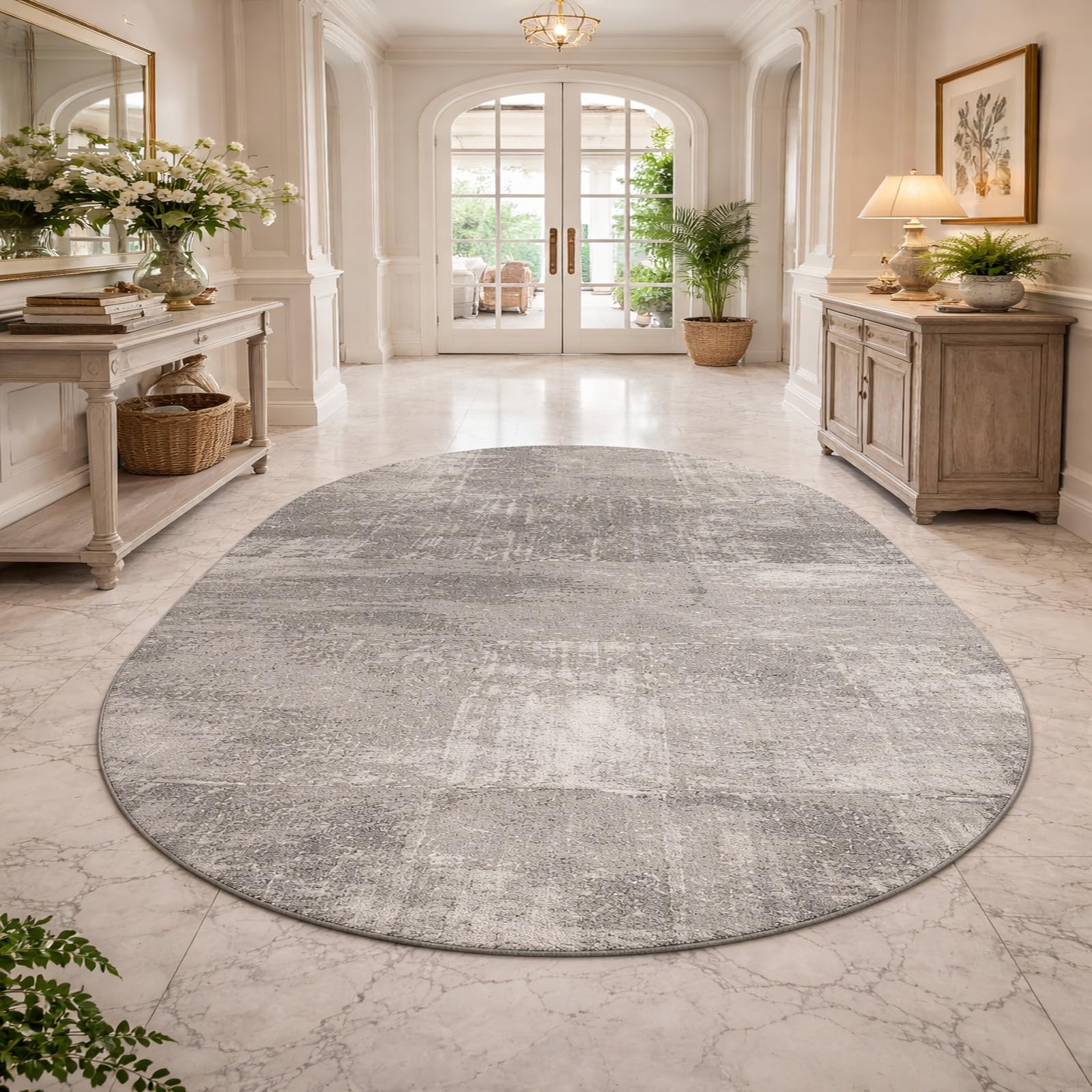 Tapis ovale salon moderne gris et noir pour sublimer le coin canapé de votre appartement