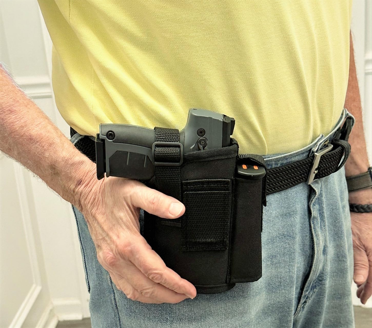Holster Compatible to fit The Byrna Model LE with an Optional Laser/Light Added Also has an Extra Magazine Pocket to Hold The Extra Mag.