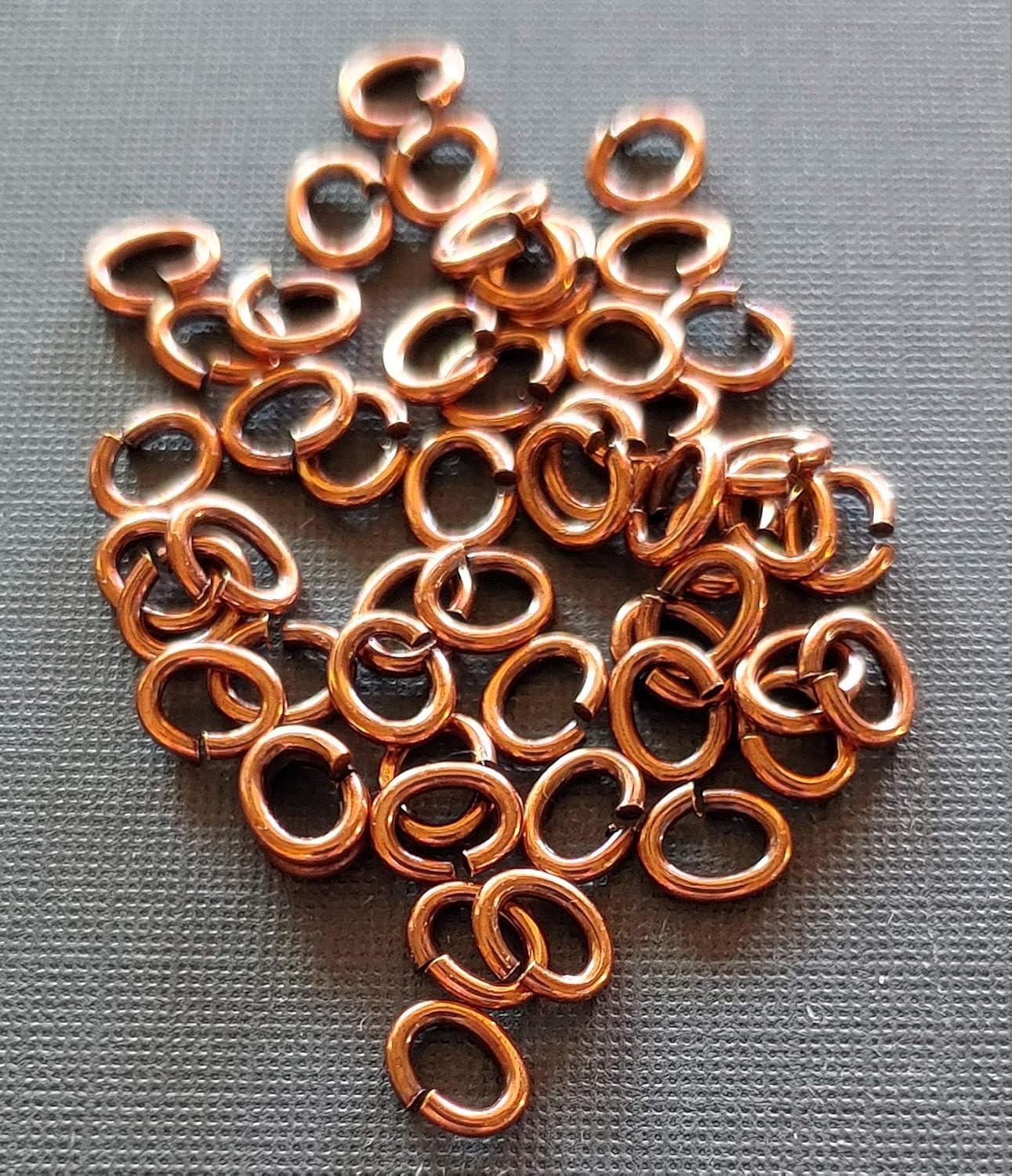 Snapeez II ULTRAPLATE Bella Flamed Antique Copper Plate Oval Jump Ring Hard Open Jump Ring 6x4mm Heavy Gauge (Pk 50) Jump Rings. The Ultra Secure No Solder Jump Ring. Made in USA.