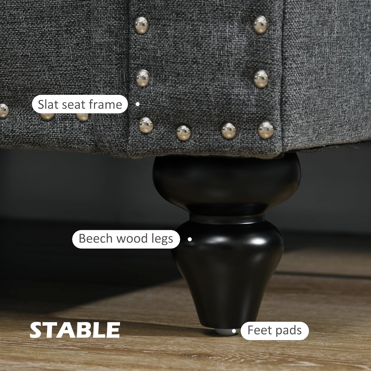 Close-up of loveseat leg and nailhead trim