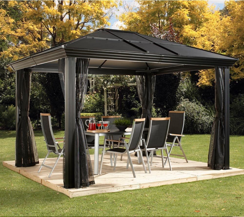Sojag Cambridge Gazebo set up on a patio with outdoor furniture