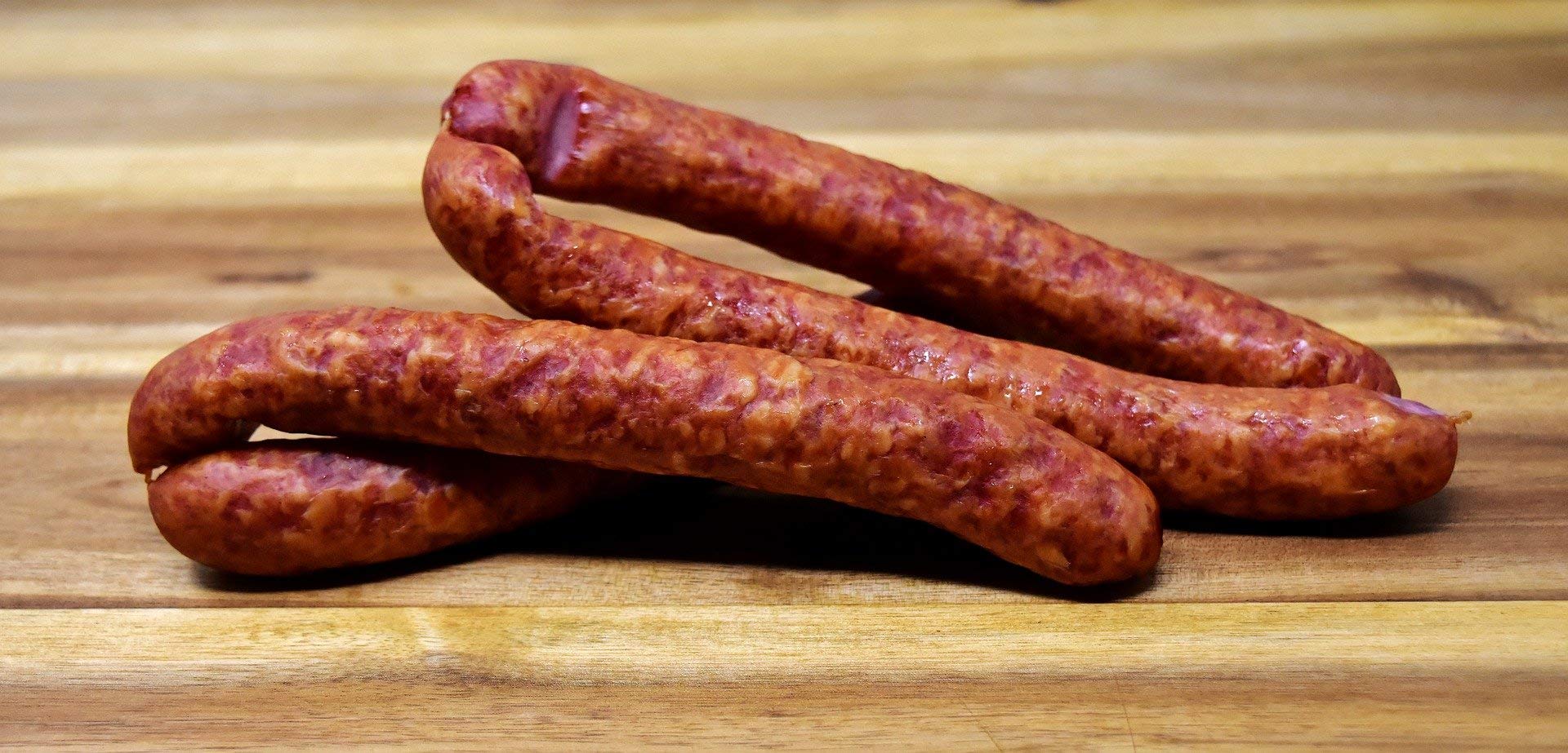 Food United Pfefferbeisser 2 kg in der GV-Aromaschutzverpackung aus 127 Gramm Schweinefleisch pro 100 Gramm natürlich gewürzt, schonend geräuchert und mit grünem Pfeffer verfeinert
