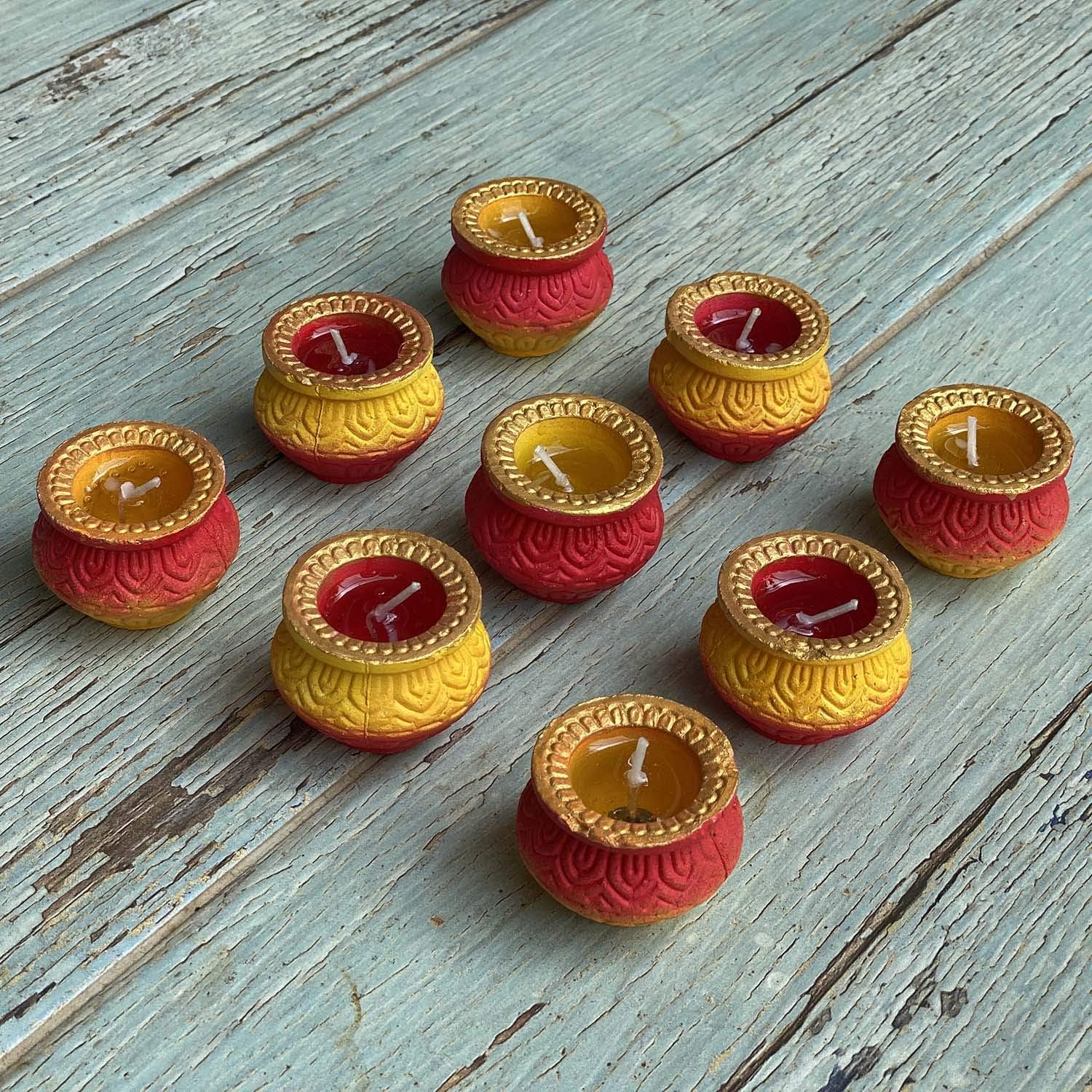 ILLUMINE by ARiANA. A Modern Matki Diya (Candle) with Gel and Mogra Fragrance (Aromatherapy), Pack of 9, A Beautiful Diwali Gift Pack (Red + Yellow)