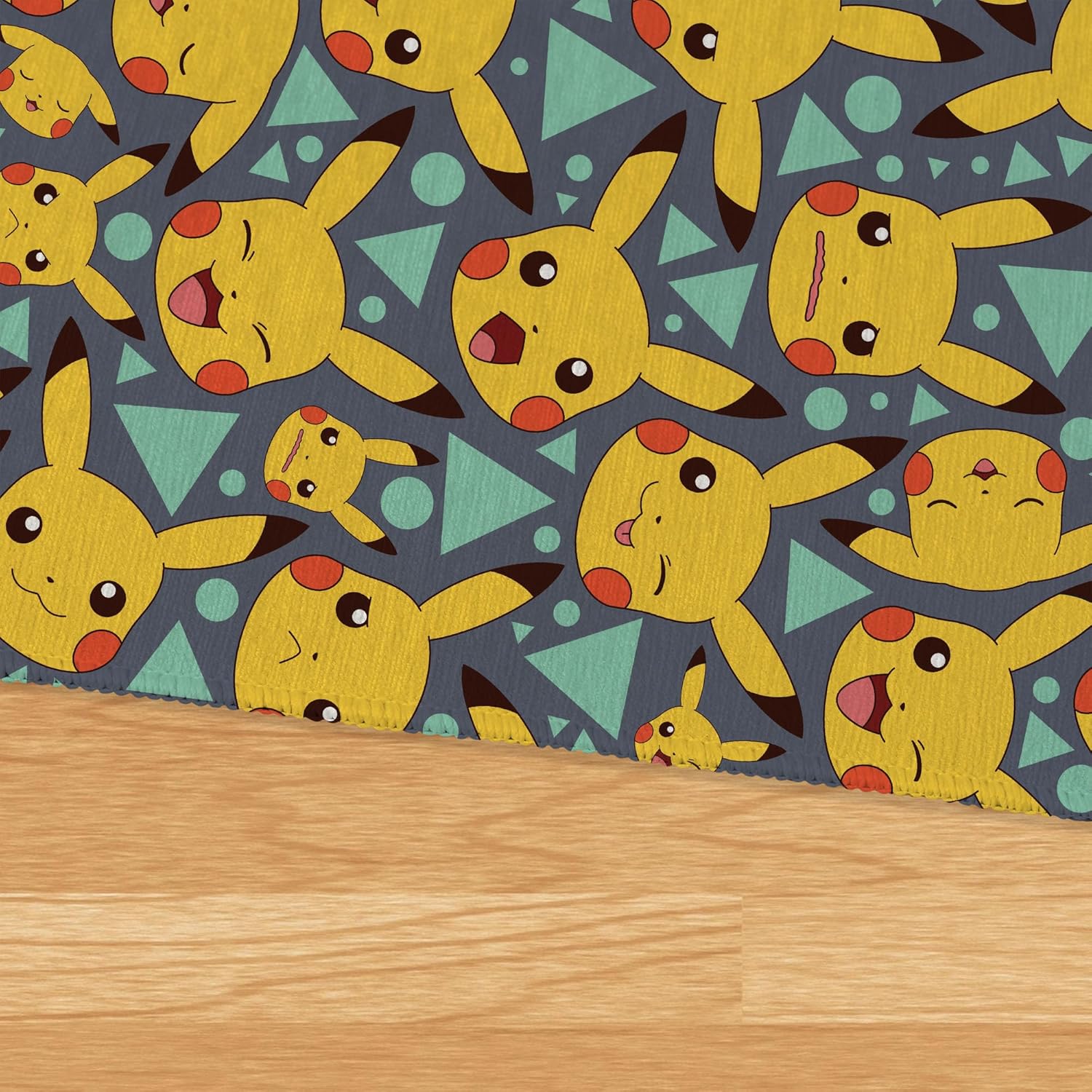 Northwest Pokemon Pikachu Expressions Area Rug, 36 x 62 in, Washable Non-Slip Mat – Official Nintendo Licensed, Soft Surface for Playroom or Bedroom