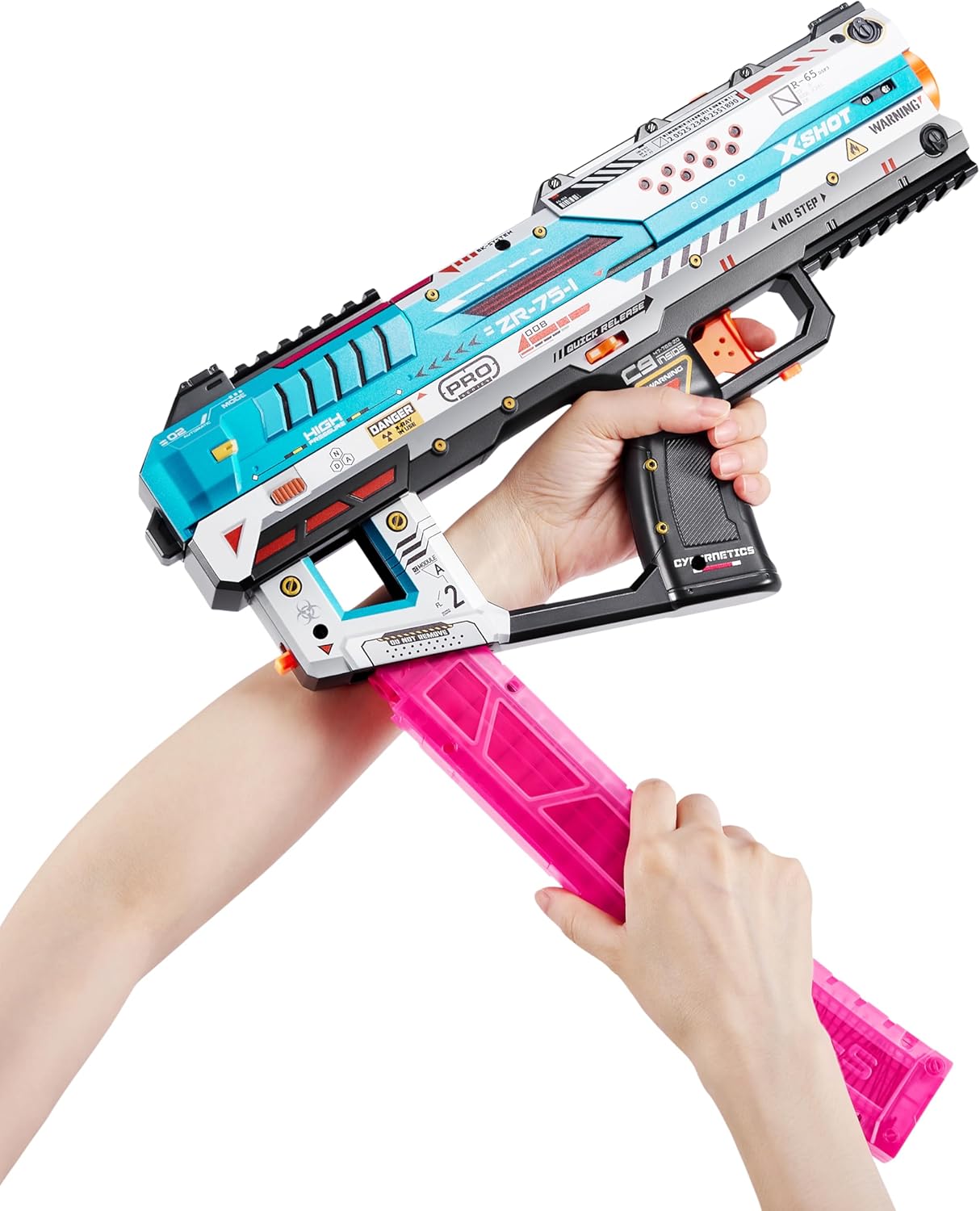 Hands inserting a pink magazine into the XSHOT Skins Pro Series Fury-X Blaster.
