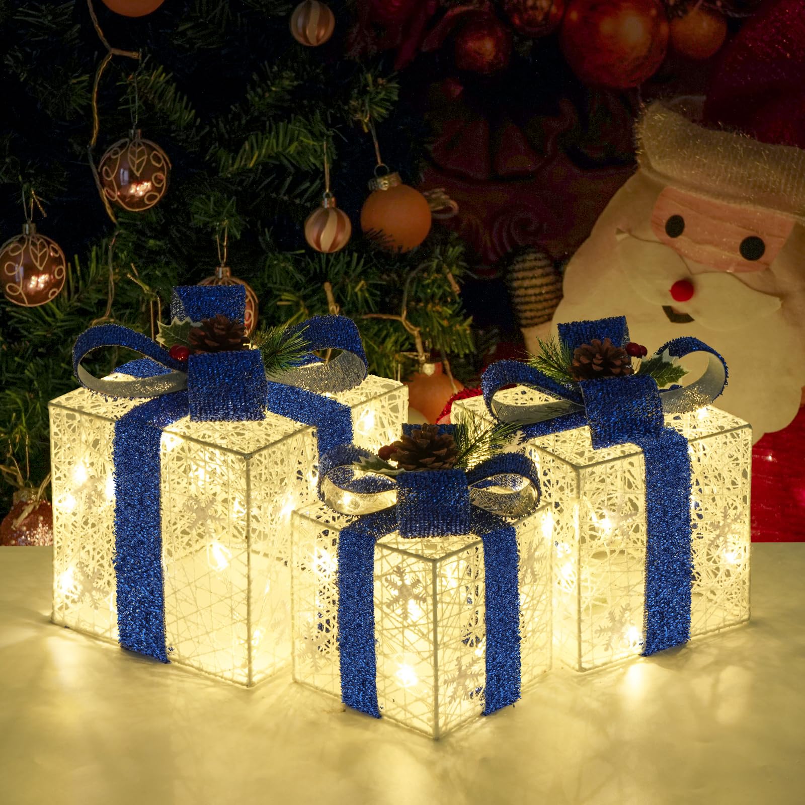 Boîtes cadeaux de Noël lumineuses pour cour et salon avec rubans bleus festifs