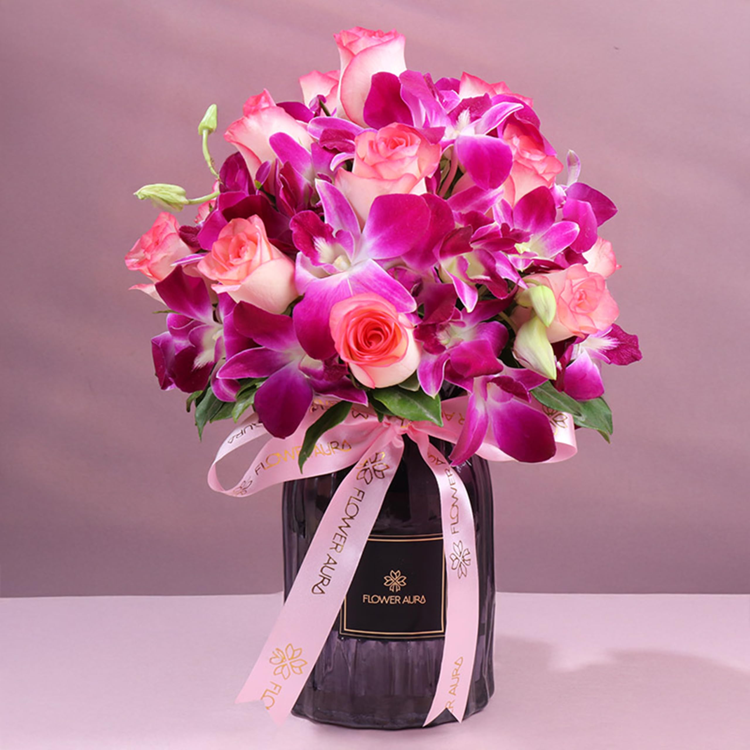FlowerAura Premium Fresh Live Flower Bouquet of 12 Pink Roses & 4 Purple Flowers In Teraflora Vase Gift For Birthday | Anniversary | Romantic Surprise | Rose Day | Valentine's Day (Same Day Delivery)-image-34
