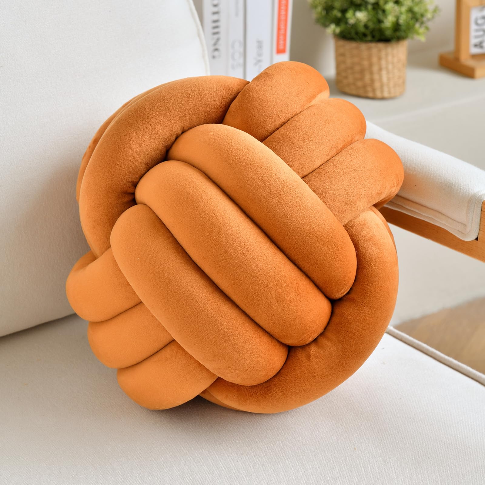 Photo 1 of LUSJNGE Decorative Throw Knot Pillow Ball for Home Chair Sofa Aesthetic Round Velvet Knotted Pillow Cushion (Caramel, 11inches)