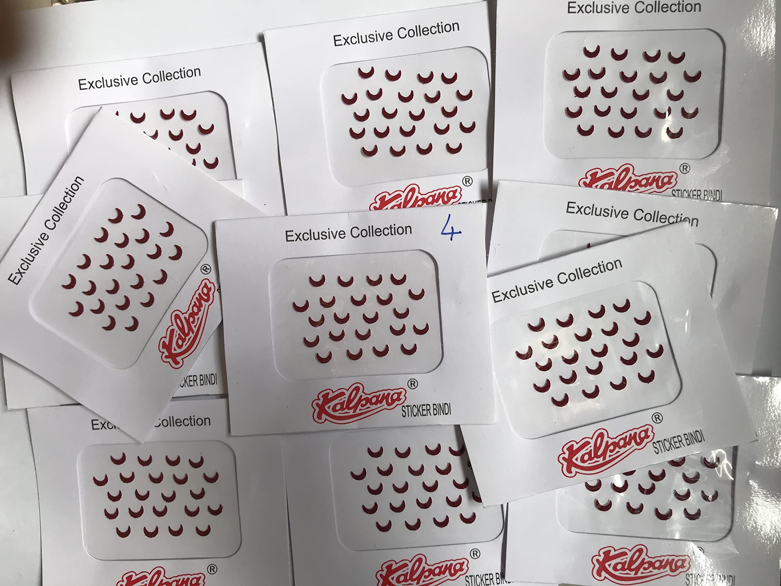 kalpana plain maroon chand sticker bindi size - 4 (pack of 12)