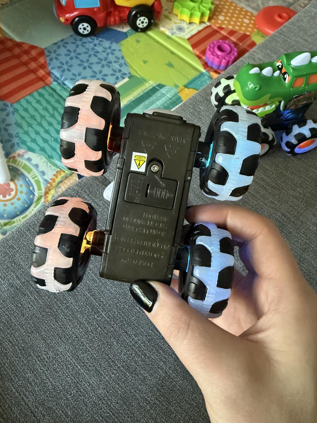 Monster Truck Toy In Use by Toddler