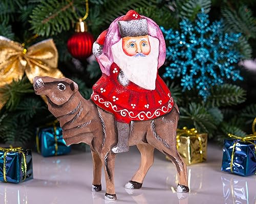 Miniatura 9 de Figura de Papá Noel tallada a mano de madera - Decoración pintada de Feliz Navidad y Año Nuevo - Talla de madera maciza - Hecho en Ucrania