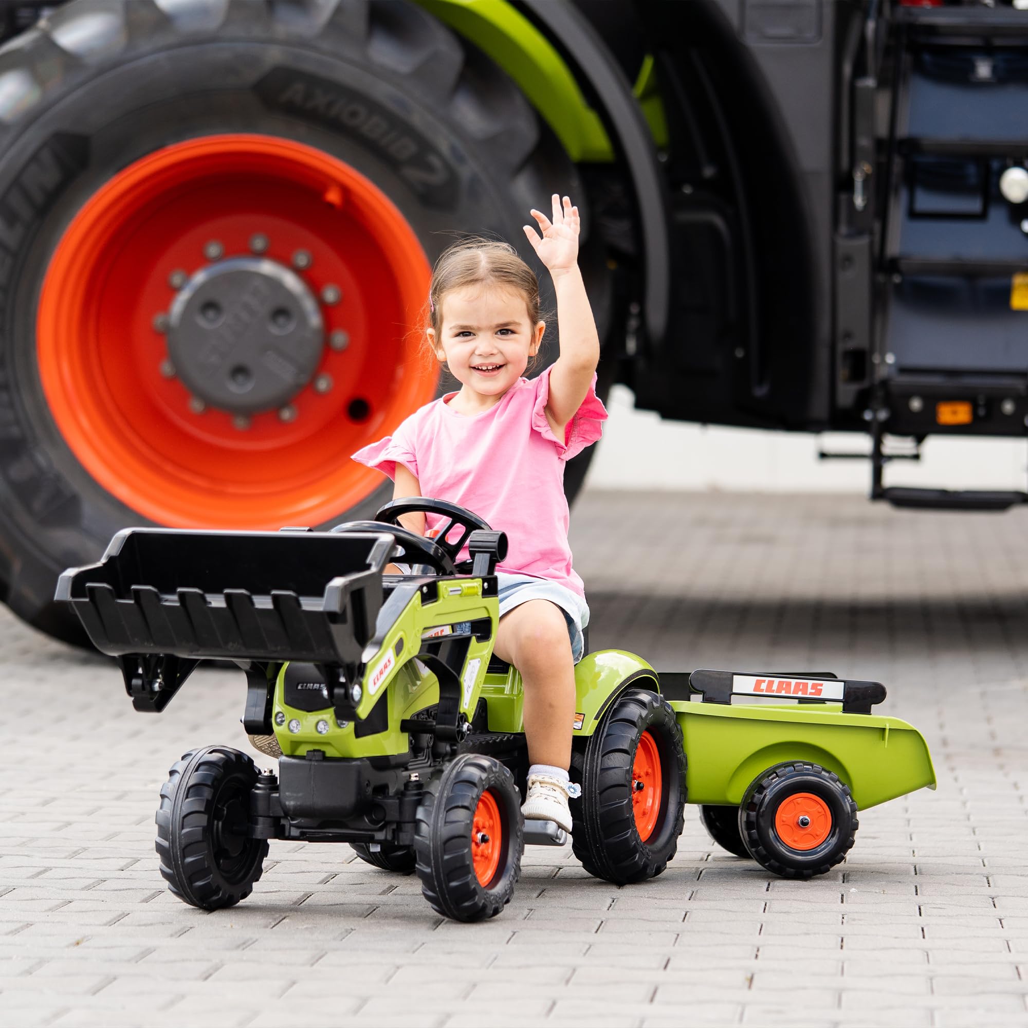 CLAAS Tractopelle Arion 410 avec remorque
