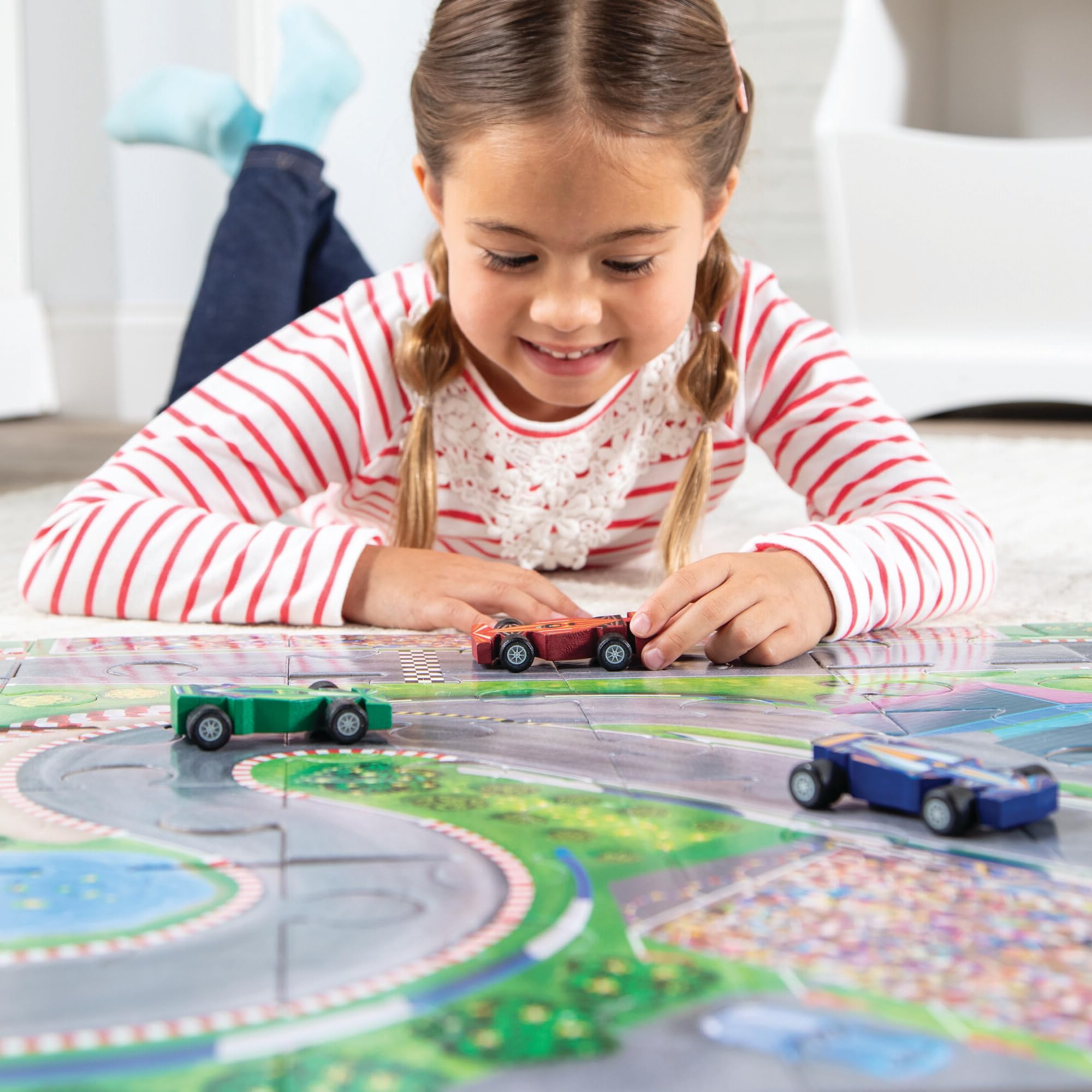 Peaceable Kingdom Puzzle & Play: Race Day - Floor Puzzle for Kids Ages 3 and Up - Includes 3 Wooden Vehicles to Zoom Around The Race Track Puzzle for a Double Dose of Fun - Measures 26" x 36" - Image 3