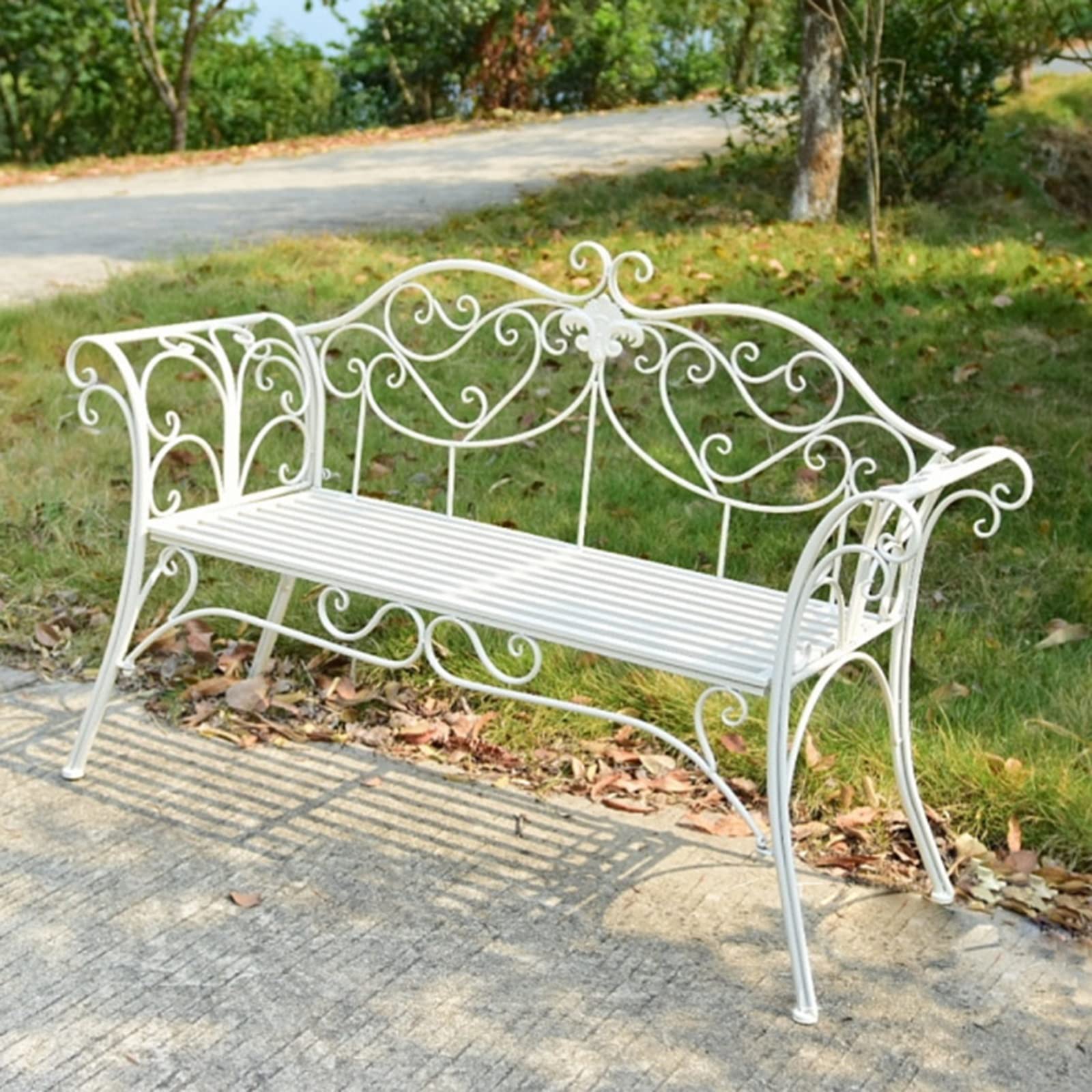 Banco de jardín metálico retro ideal para decorar tu porche o terraza familiar