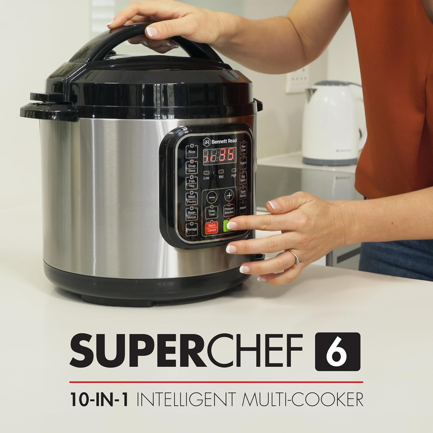 User interacting with the control panel of the multi-cooker