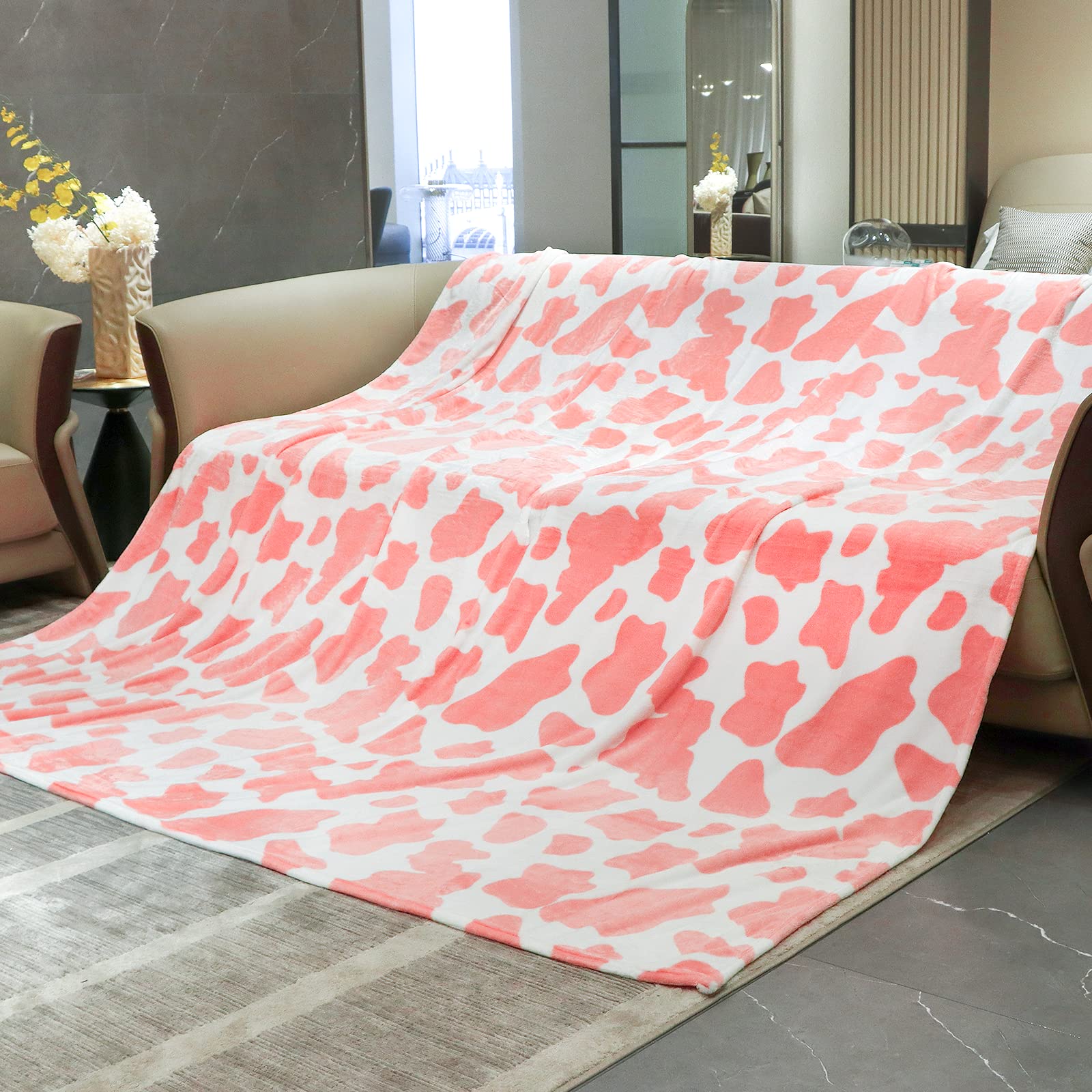 Couverture imprimée vache pour vos soirées cocooning au salon ou pique-nique
