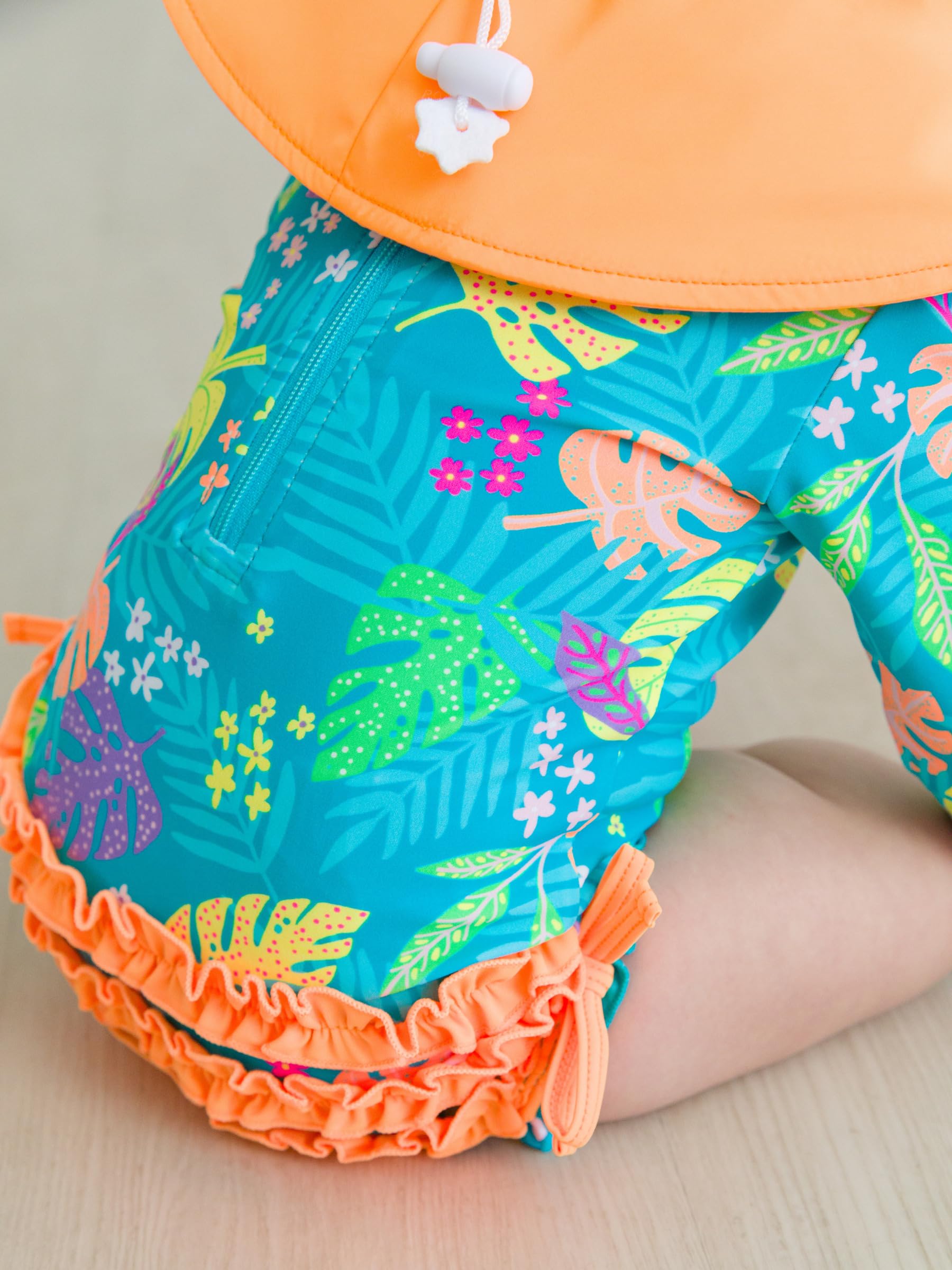 RuffleButts Costume da bagno intero a maniche lunghe con protezione solare UPF 50, a pois, con cerniera, a pois color acqua brillante, 3-6 m