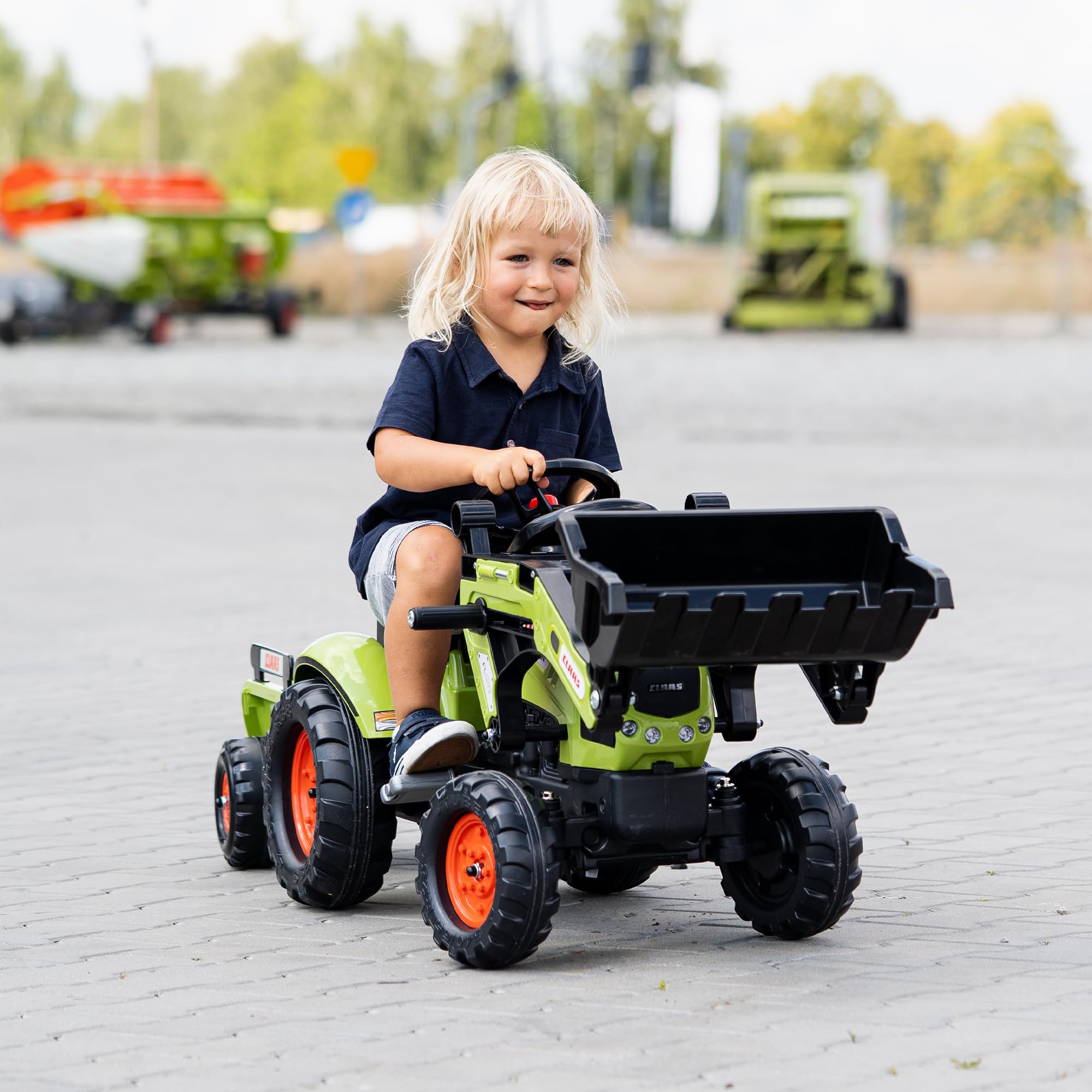 CLAAS Tractopelle Arion 410 avec remorque