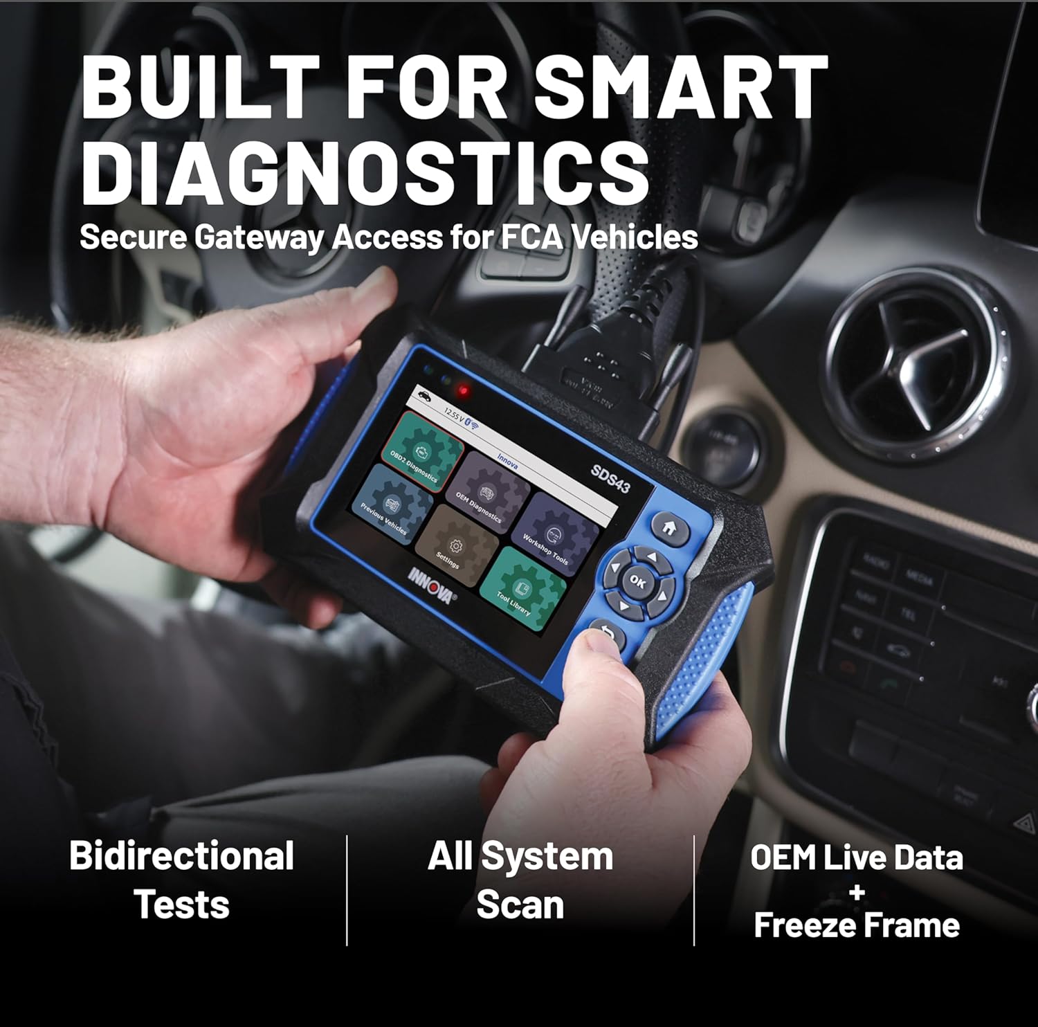 Innova SDS43 scanner being used in a car for diagnostics