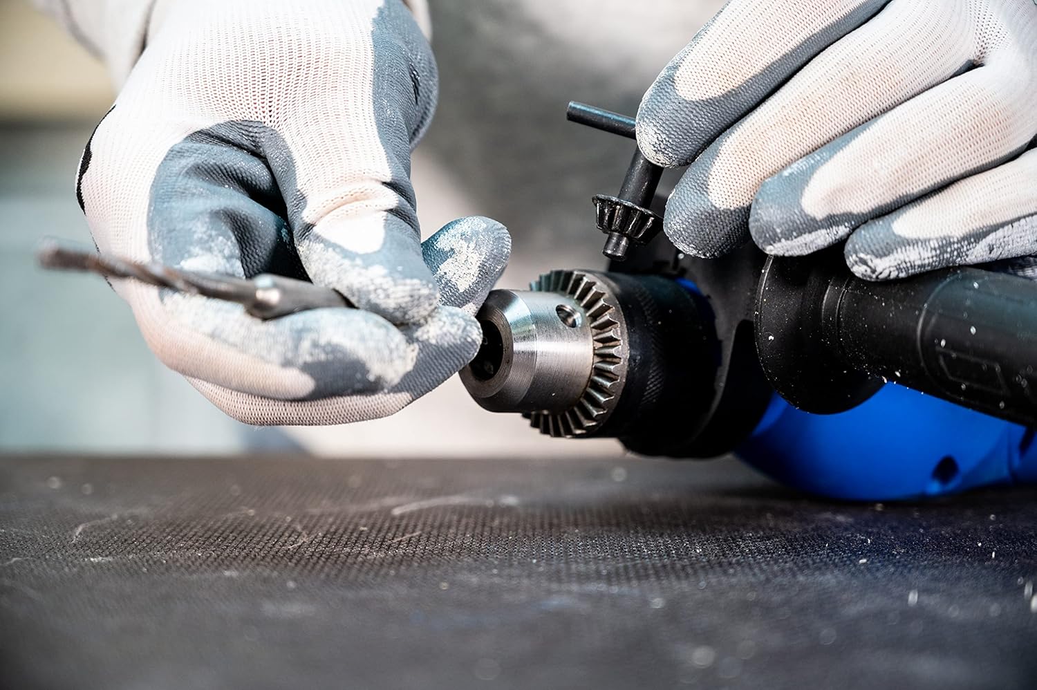 Inserting drill bit into chuck