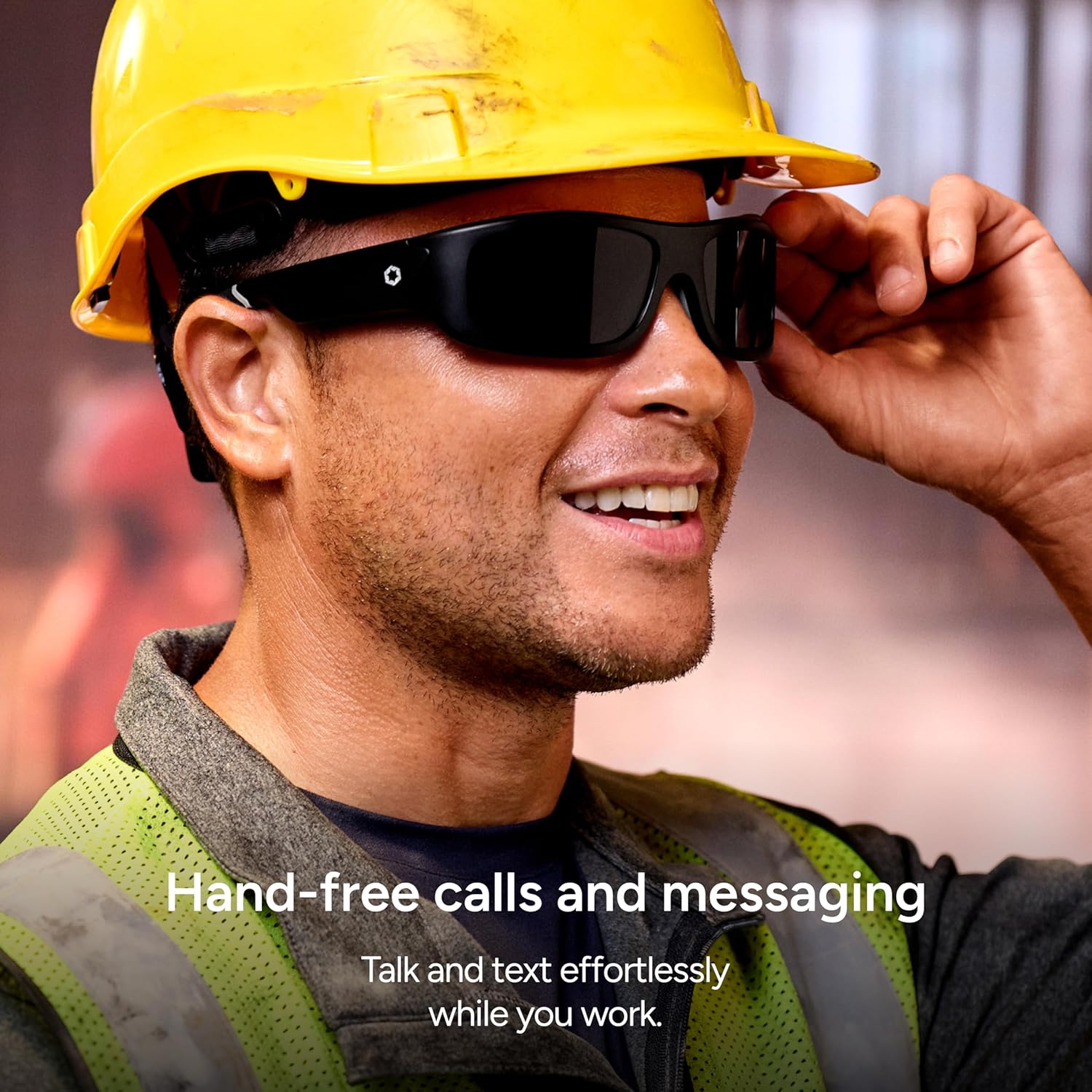 Man wearing Lucyd Armor Smart Safety Glasses, making a hands-free call