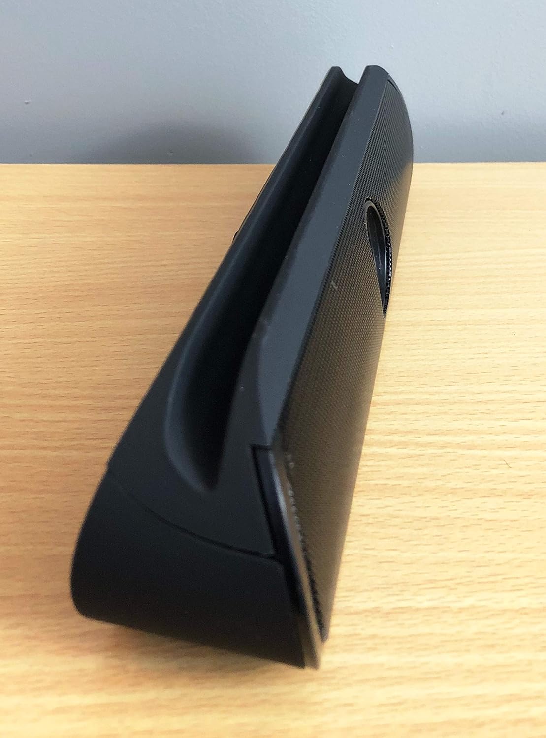 Side view of the Bass Jaxx Duo Portable Speaker showing the smartphone/tablet holder slot