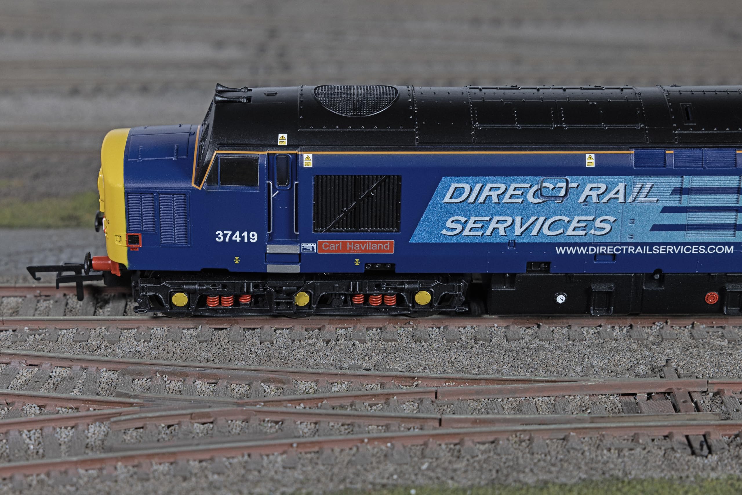 Hornby - R30437TXS Eisenbahn - DRS - Klasse 37 - 'Carl Haviland' 37419 (mit DCC-Sound) Lokomotive Epoche 11 Modellzug