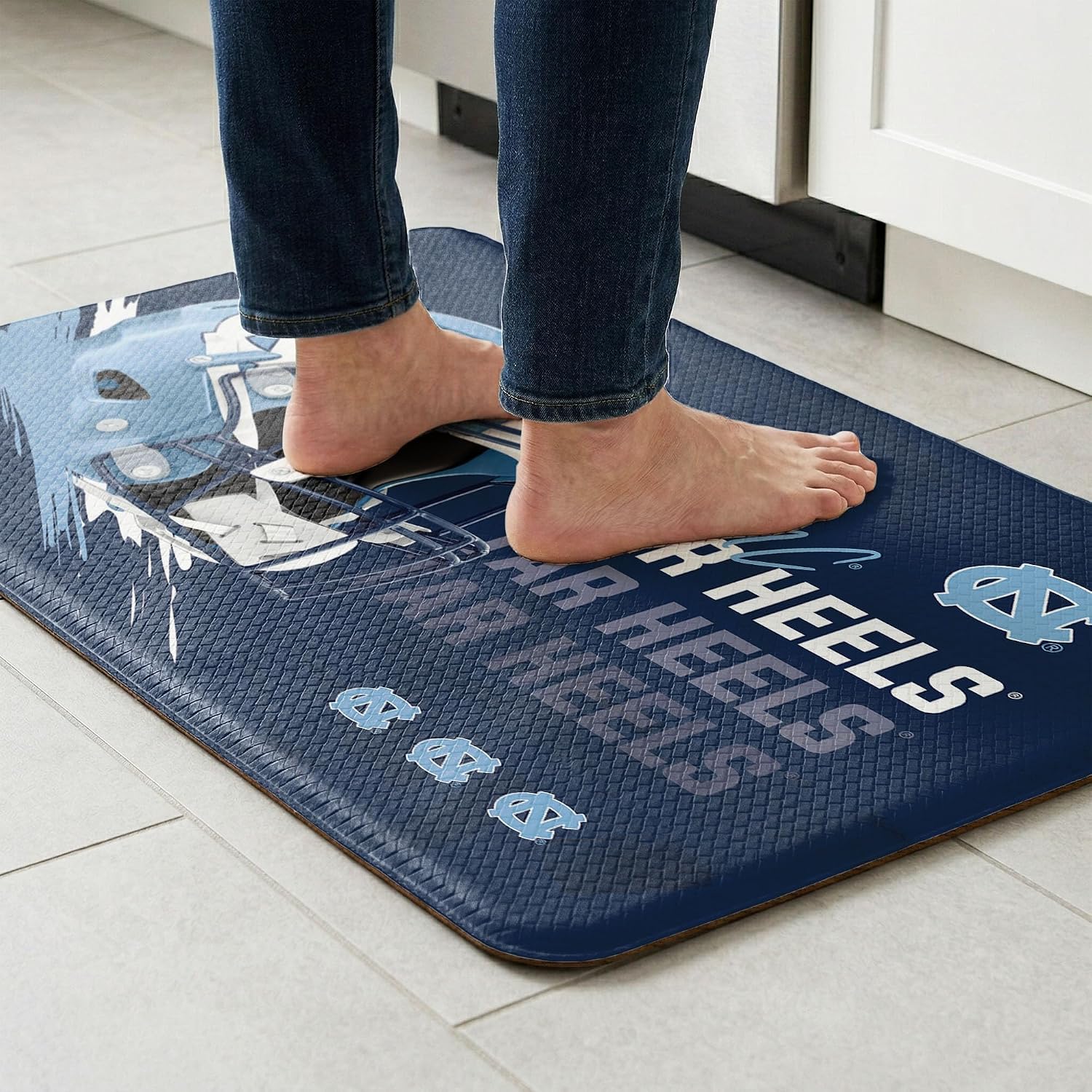 Northwest NCAA North Carolina Tar Heels Embossed Anti-Fatigue Mat, Cushioned Kitchen Floor Rug, Non-Slip PVC Standing Comfort, 18 x 30 in