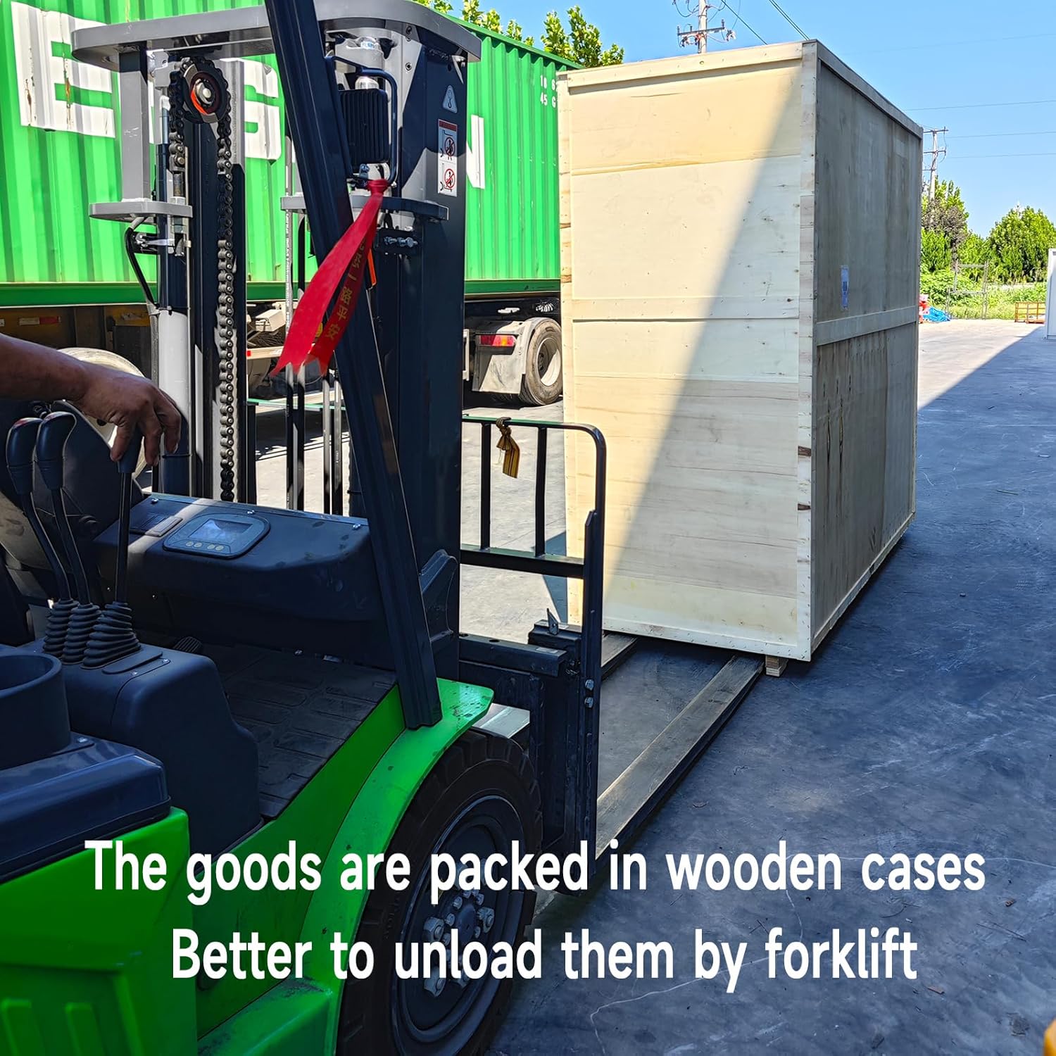 Excavator packed in a wooden case being unloaded by a forklift