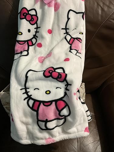 Jay Franco & Sons, Inc. Mantas y mantas de Hello Kitty (blanco con lazos rosados y lunares, manta - 50 x 70)