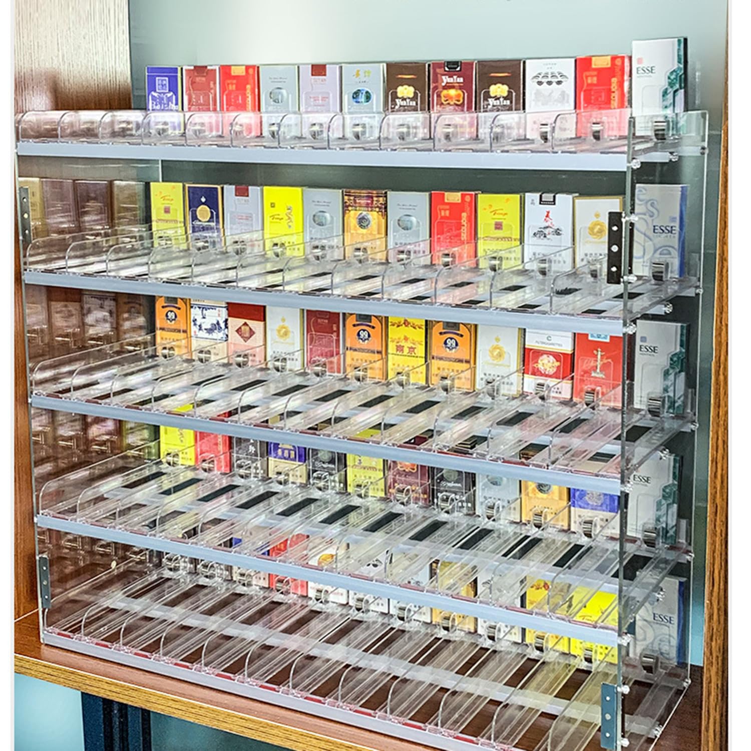 Porte-cigarettes mural à poussoirs automatiques pour une distribution fluide en magasin