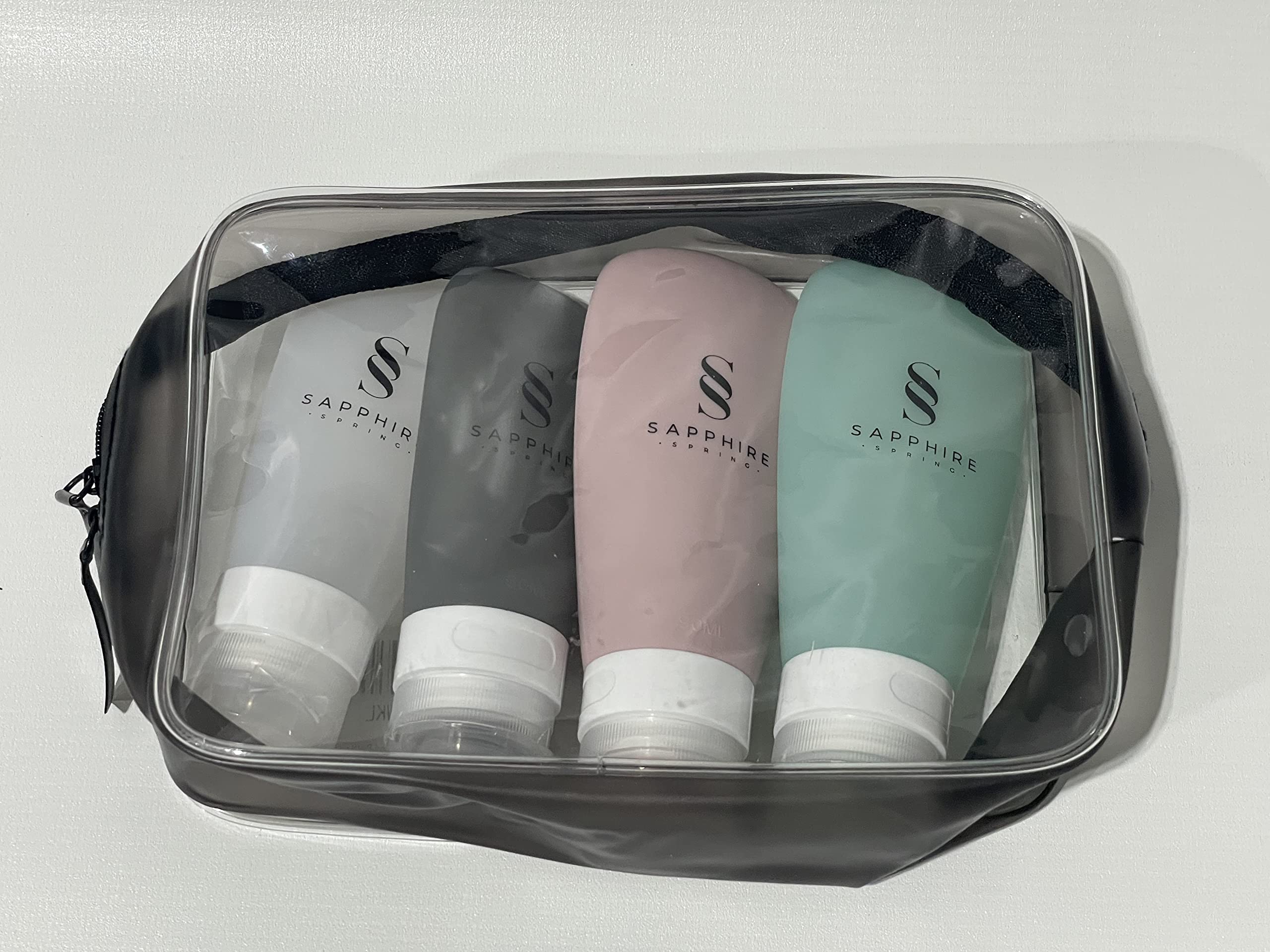 Sapphire Spring Multi-Colored Refillable Silicon Travel Bottle Set (4-Pack)