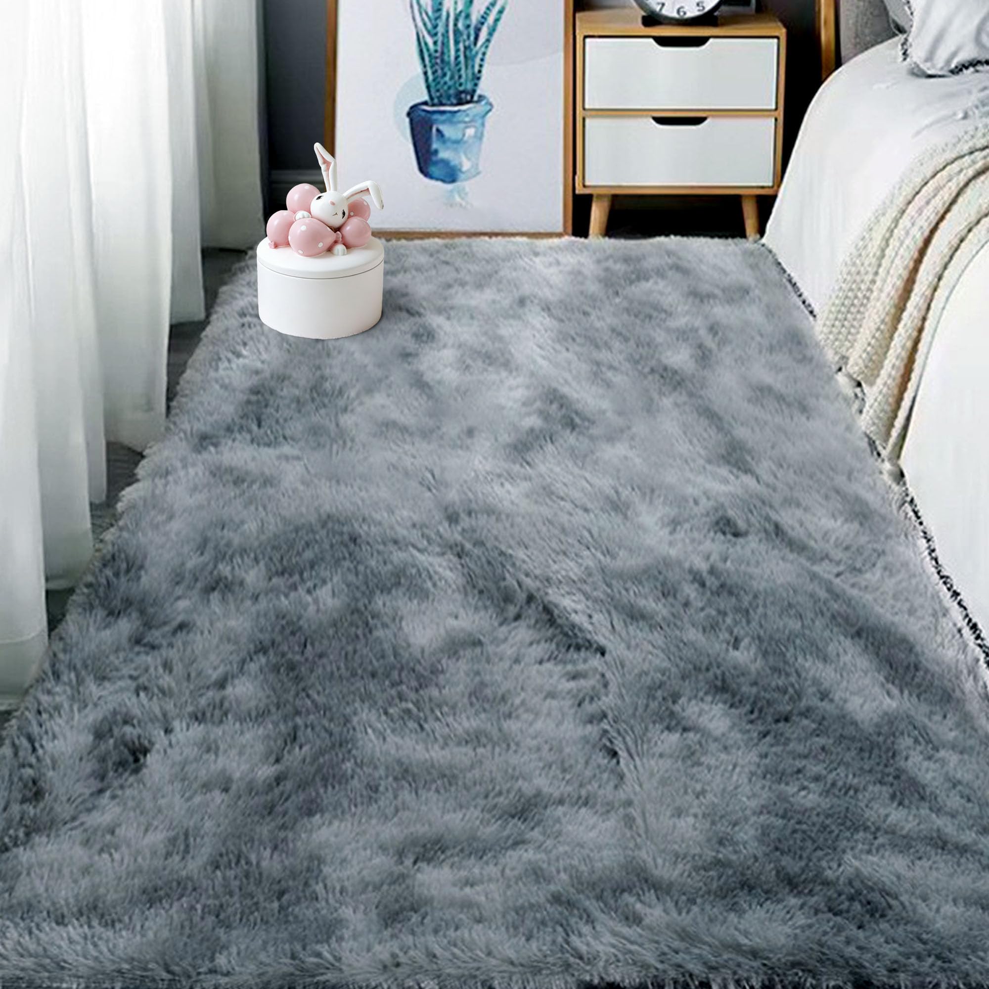 Tapis de chambre style moderne gris clair pour réchauffer le salon familial