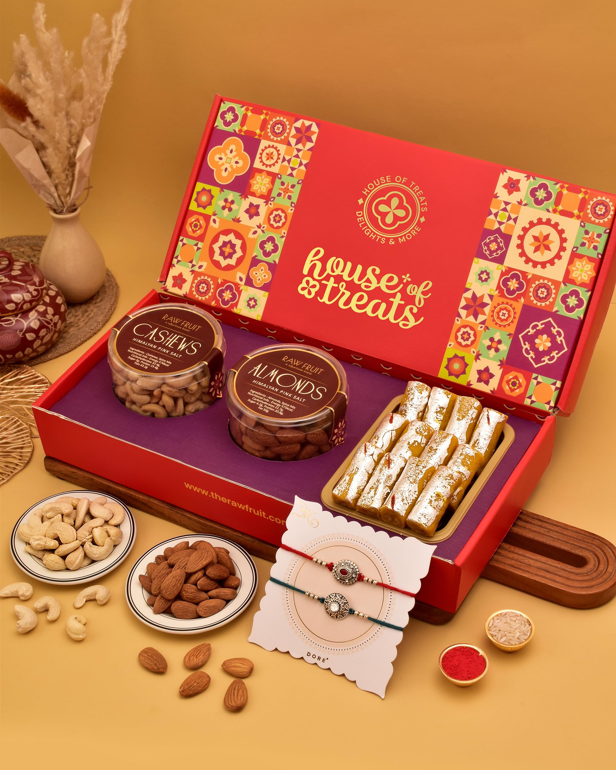 House Of TreatsĀ® Rakhi Set Of 2 With Sweets Rakhi Combo With Sweets Rakhi With Dry Fruits For Brother Roasted Dryfruits Cashew Almond Kesarroll Ruby & Sapphire Rakhi Pack Of 2 Rakhi Set With Sweets