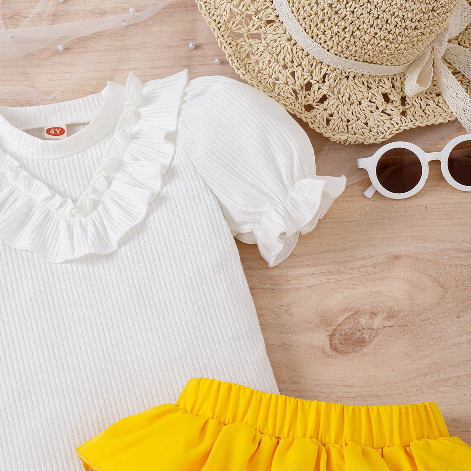 yellow ruffle top