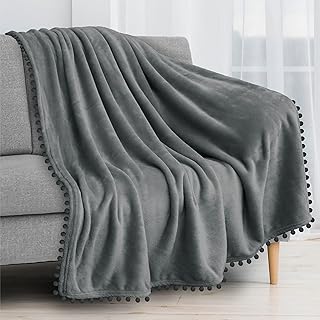 PAVILIA Fleece Throw Blanket for Couch with Pom Pom Fringe, Dark Grey, Soft Cozy Fuzzy Flannel Blanket for Sofa Bed, Light...