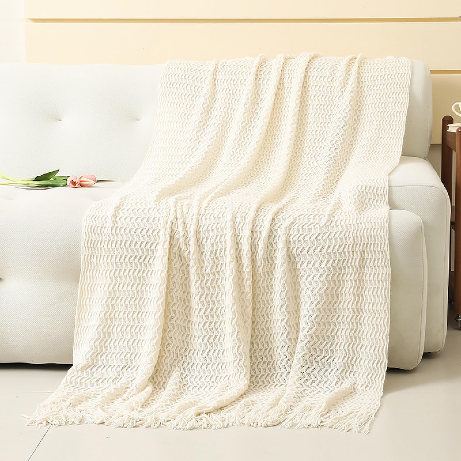Couverture canapé bohème en tricot pour vos soirées cocooning