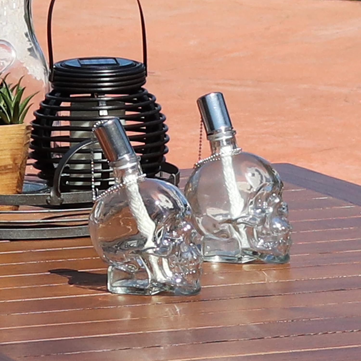Sunnydaze Grinning Skull Glass Tabletop Torches - Outdoor Patio Lighting - Includes Wicks and Attached Snuffers - Set of 4 Refillable Torches - Clear