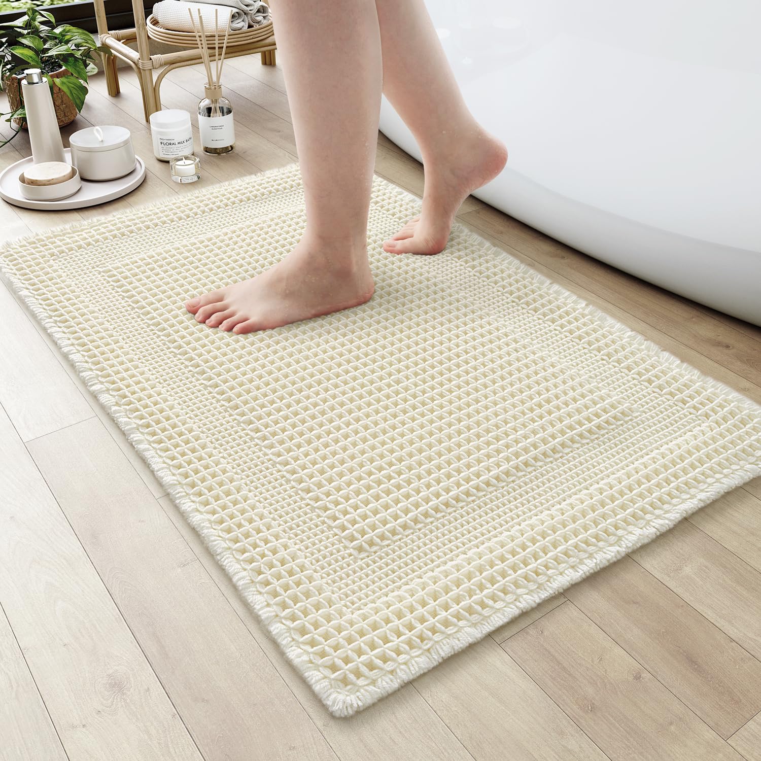 AMOAMI Waffle Bath-Mat, Absorbent Bath Mats for Bathroom Non Slip, Machine Washable Bathroom Rugs with Tassels Ultra Soft Boho Bath Rugs for Bathroom Floor 18"x30" Cream