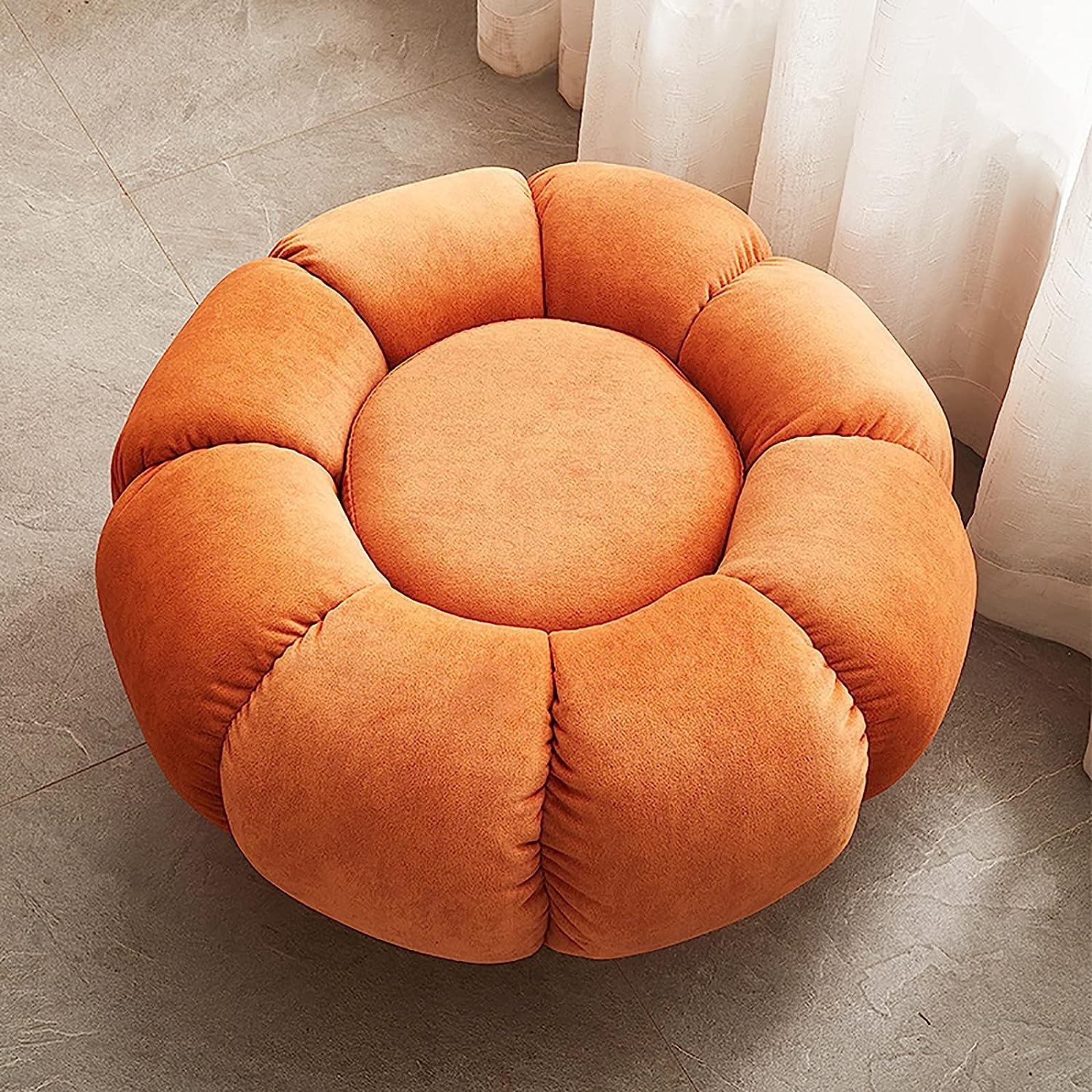 Repose-pieds citrouille en daim orange et pouf de salon design chic